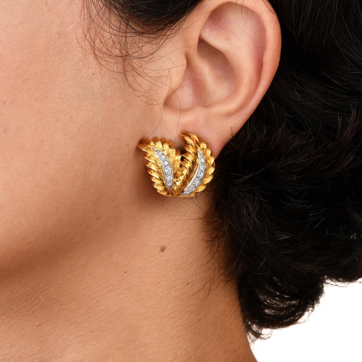Add a touch of luxury to your ensemble with these Vintage Retro Diamond 18K Gold Leaf Floral Clip-On Earrings.

Crafted in solid 18K Yellow & White Gold, enhanced by Round cut Diamonds, in beautiful contrast with yellow gold.

Showcase a perfect