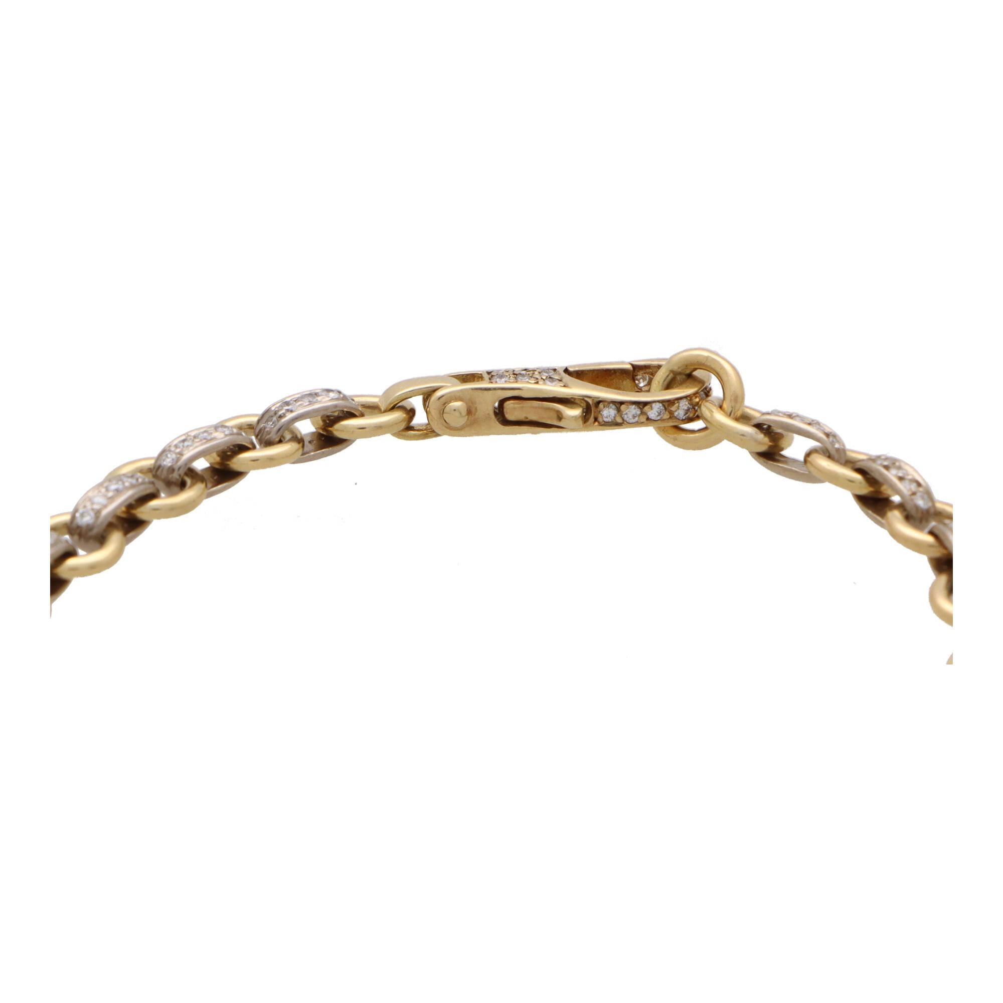  A simple yet elegant diamond chain link bracelet set in 18k yellow gold.

The bracelet is composed of 25 circular yellow gold links connected together via diamond set whit gold oval links. The diamonds are subtle yet elegant and make the bracelet a