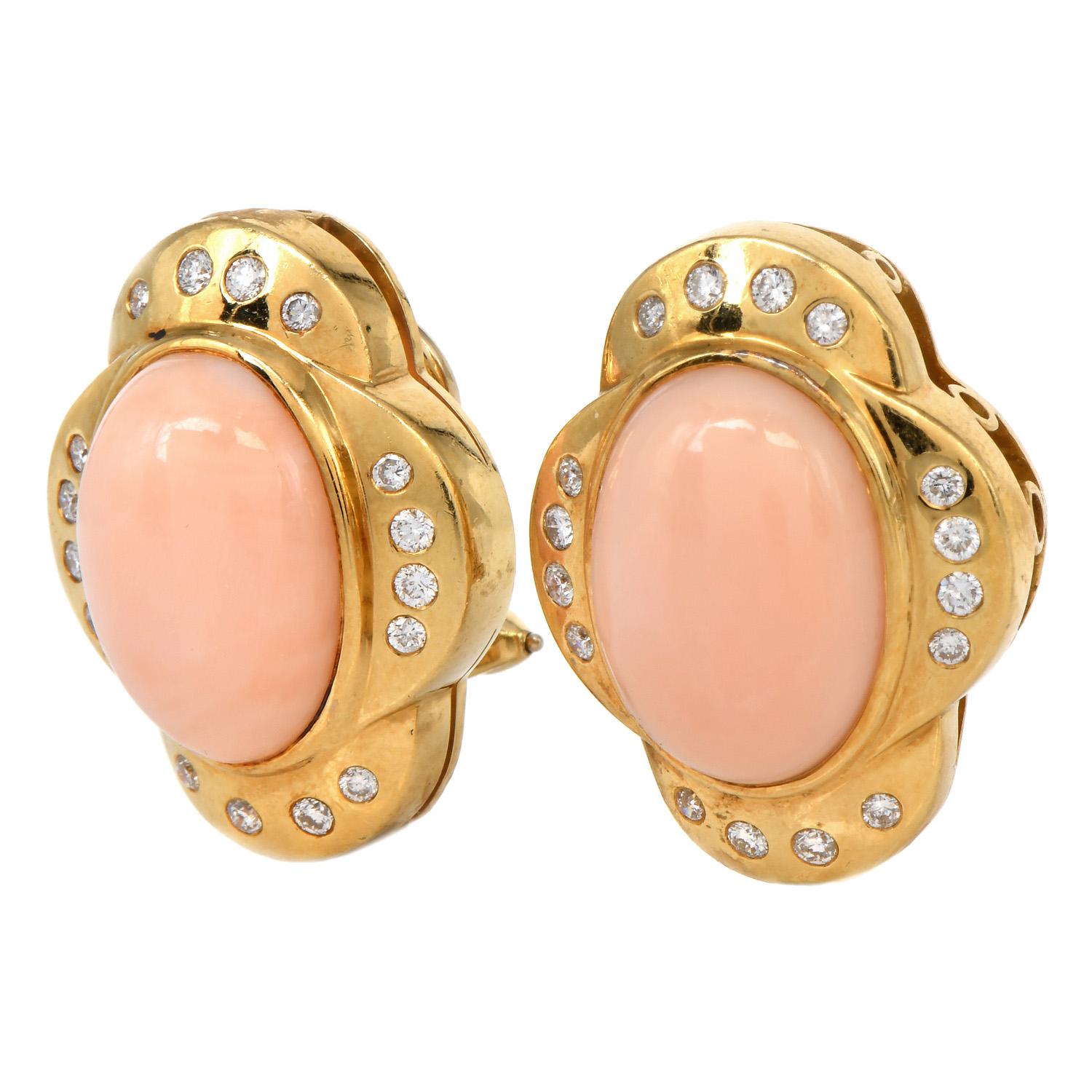 A nature's touch in these floral soft pink Natural Coral Earrings.

These 1990's Crafted in 18K yellow gold, each set with a cabochon genuine Soft Pink Genuine Coral, measuring 17.5 mm x 13 mm x 4.5 mm.

Adorning the highly polished surface are (32)