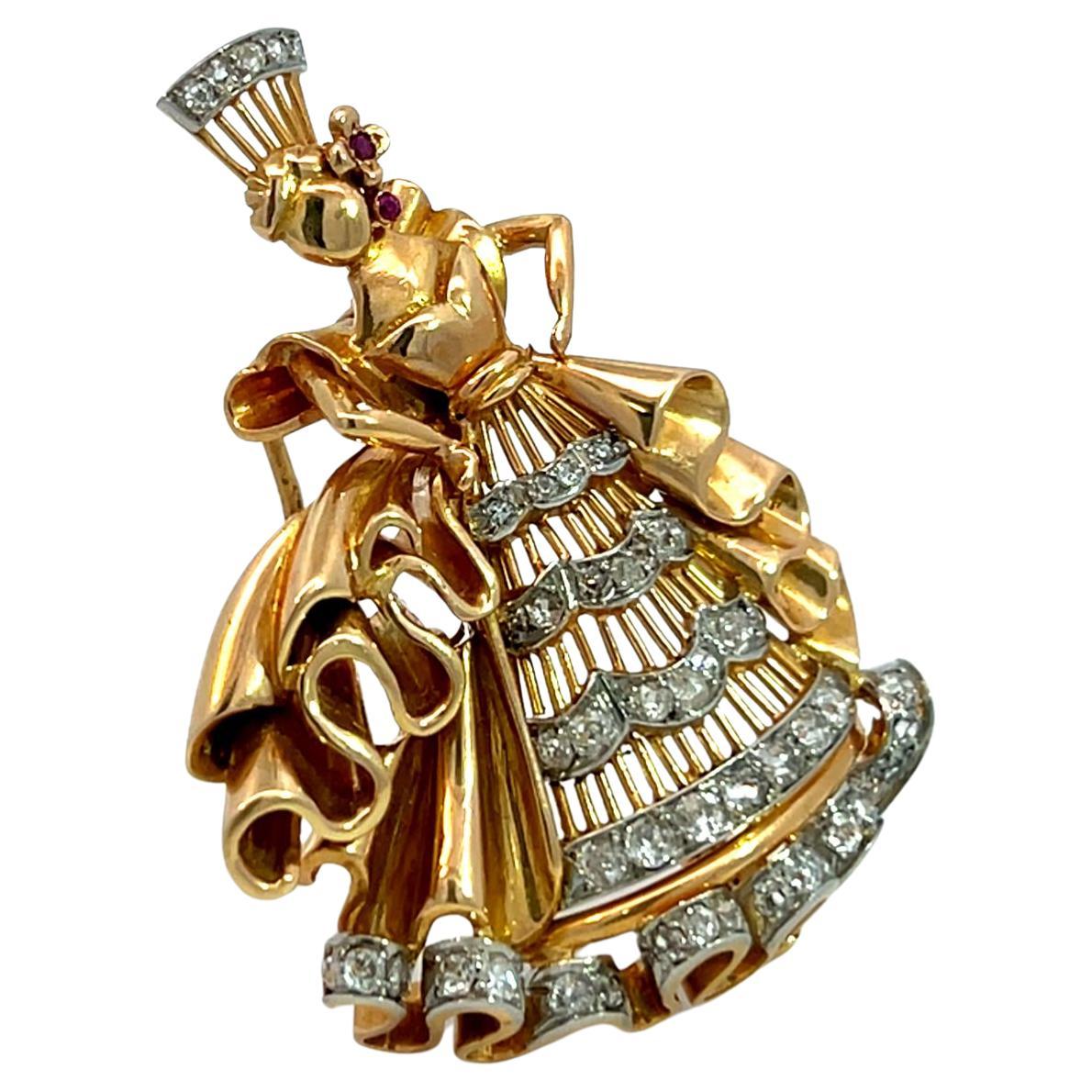 This elegant 18K gold brooch is inspired by a queen's flowing gown, blending intricate design with timeless sophistication. It features 45 old-cut diamonds, totaling 1.25 carats, carefully set to highlight the gown's details, including the dress and