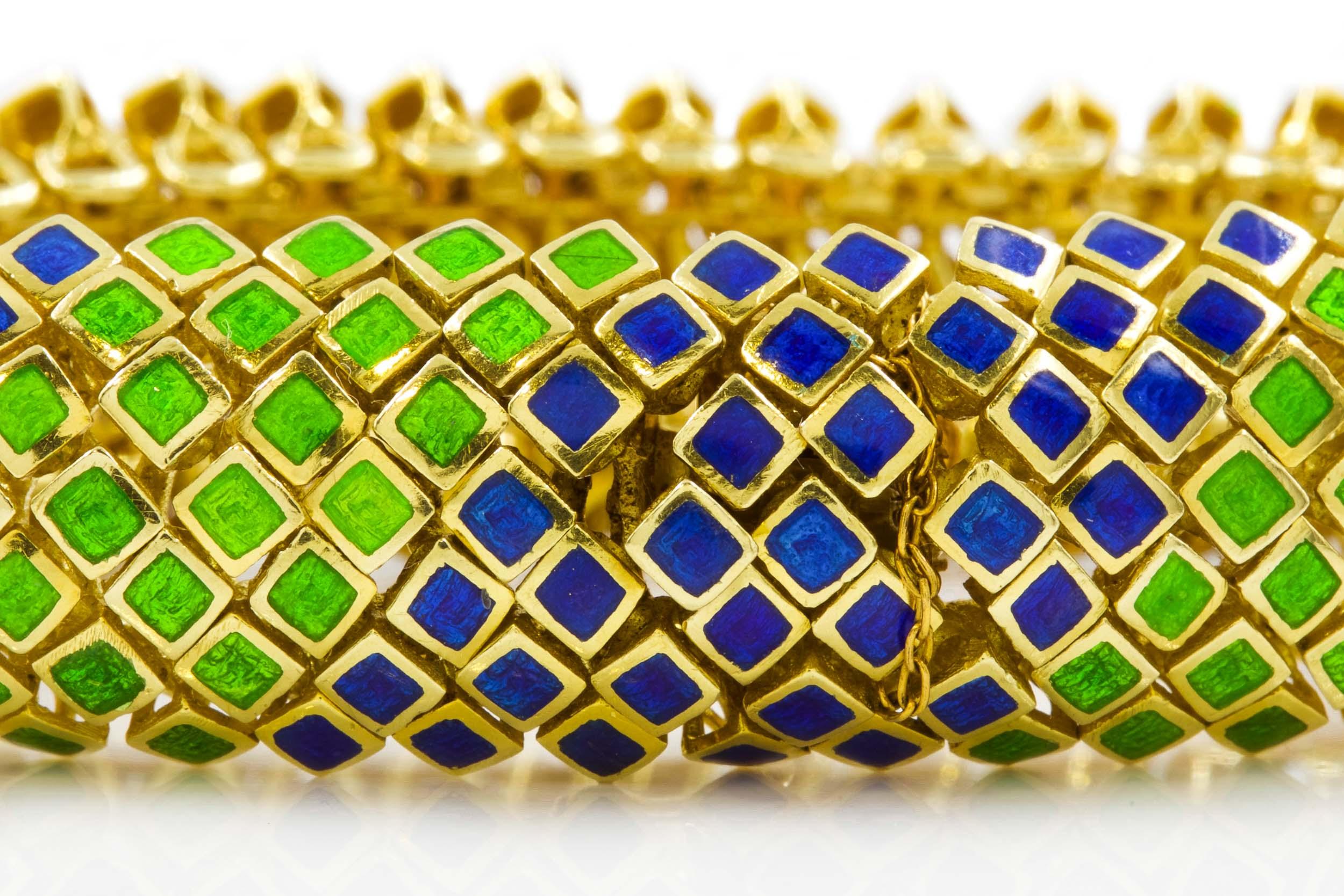 RETRO 18K GOLD AND ENAMEL FLEXIBLE-LINK BRACELET
With cobalt blue and translucent green enamel  circa 1960s
Item # 109TQV22R 

A finely crafted work of art, this intricate flexible-link bracelet is an incredibly fun and playful statement piece. Each