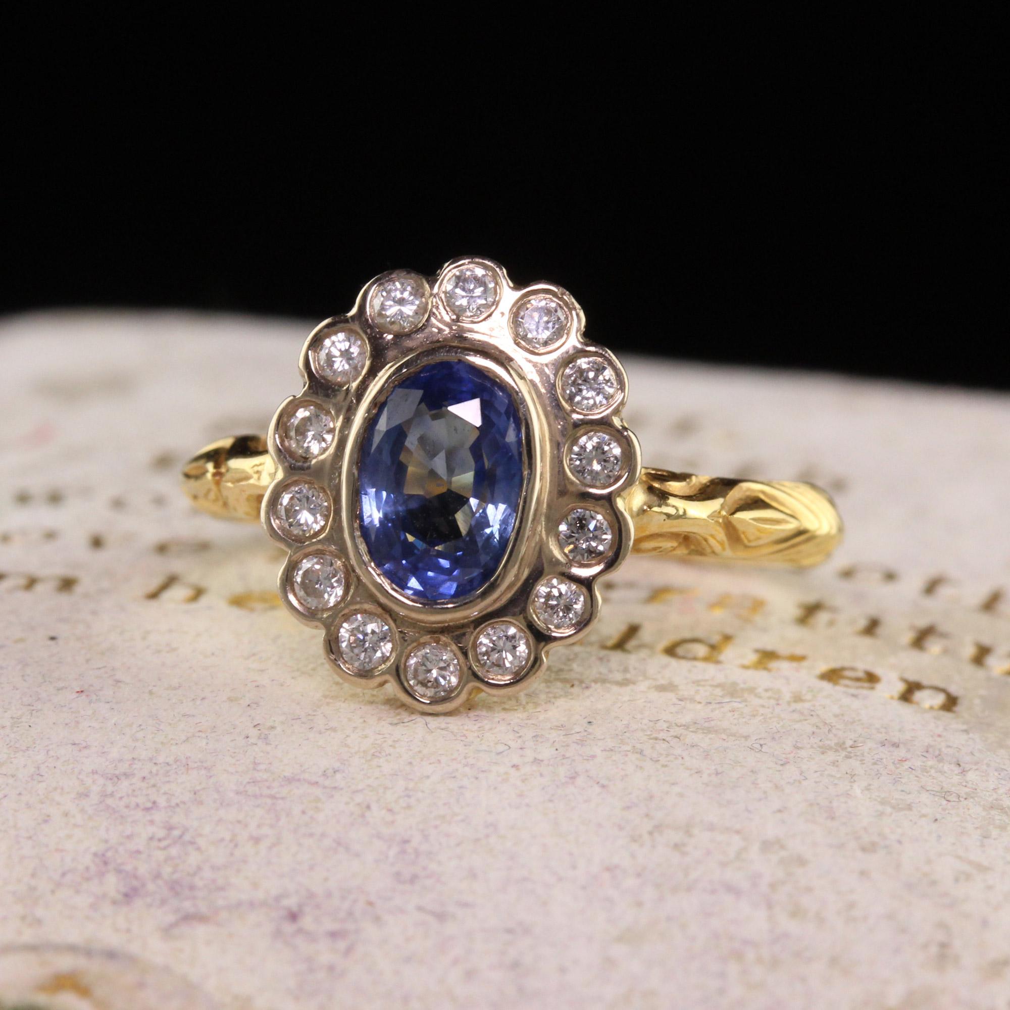 Beautiful Vintage Retro English 18K Yellow Gold Natural Sapphire Diamond Engagement Ring. This beautiful English engagement ring is crafted in 18k yellow gold. The center holds a natural blue cornflower color sapphire and is surrounded by natural