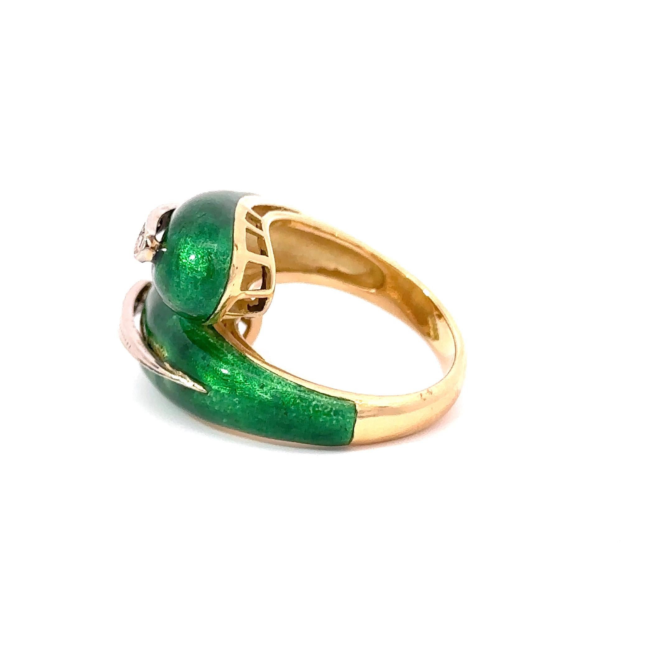 This classic Italian ring features shimmering 0.10CT-TW diamonds, set in shining 18KT yellow gold and encased in exquisite green enamel, all in a beautiful wrap-around silhouette perfect for any occasion. Size 5.5 US. Weight 12.6 gm.