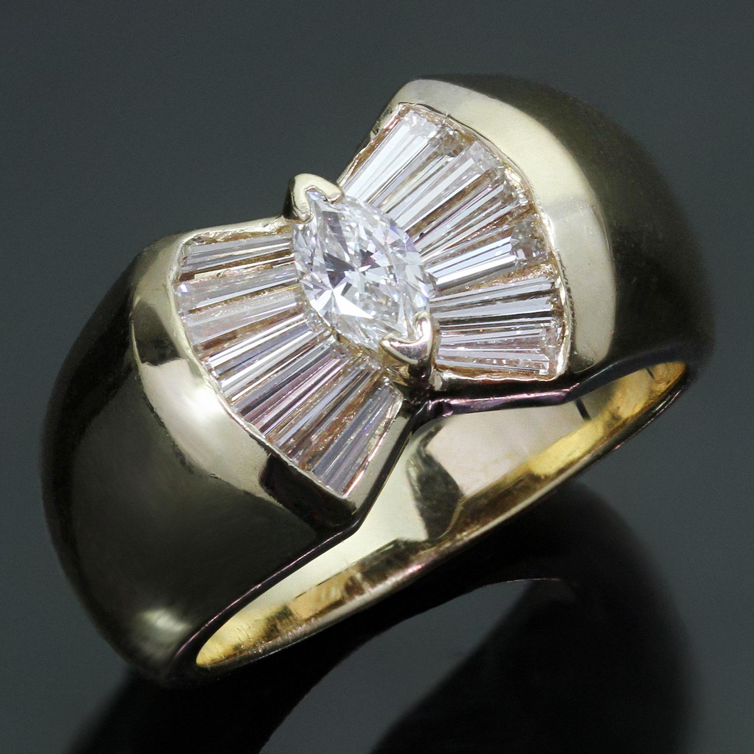 This fabulous retro women's ring is crafted in 14k yellow gold and set with a marquise diamond center stone weighing an estimated 0.25 carats, acented with 14 baguette-cut diamonds weighing an estimated 1.15. Made in United States circa 1980s.