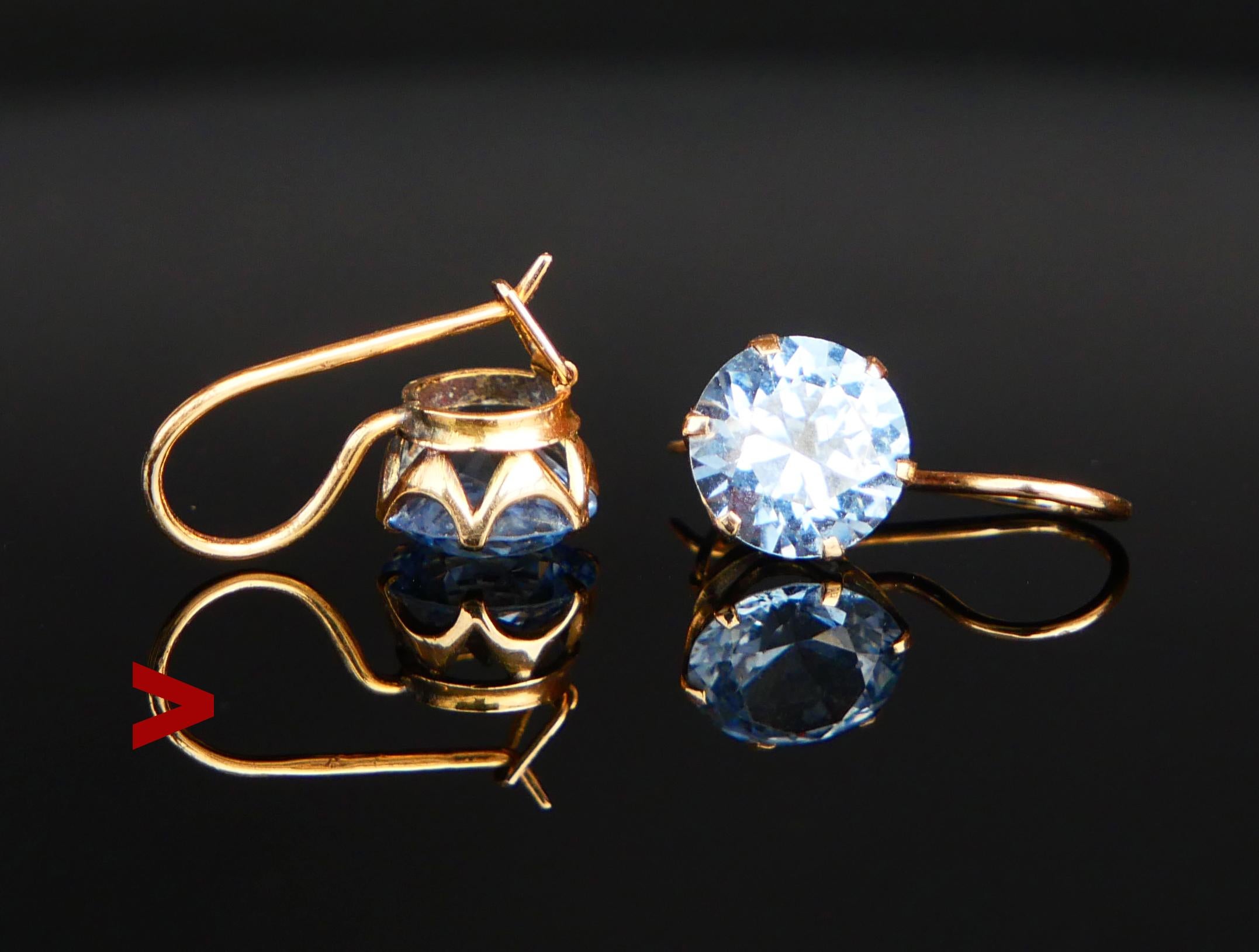 A pair of Finish Retro Vintage 14K Earrings on secure hooks with claw set diamond cut Blue Spinel stones.
Stones are likely lab made and closely imitate valuable Natural light blue Spinels.

Made in Finland ,both wires hallmarked 585 for 14K