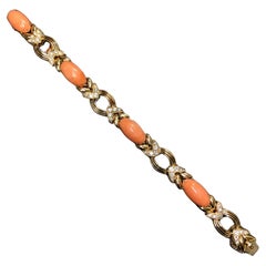 Bracelet rétro FRANÇAIS en or jaune 18 carats, diamants, corail rose cabochon 7