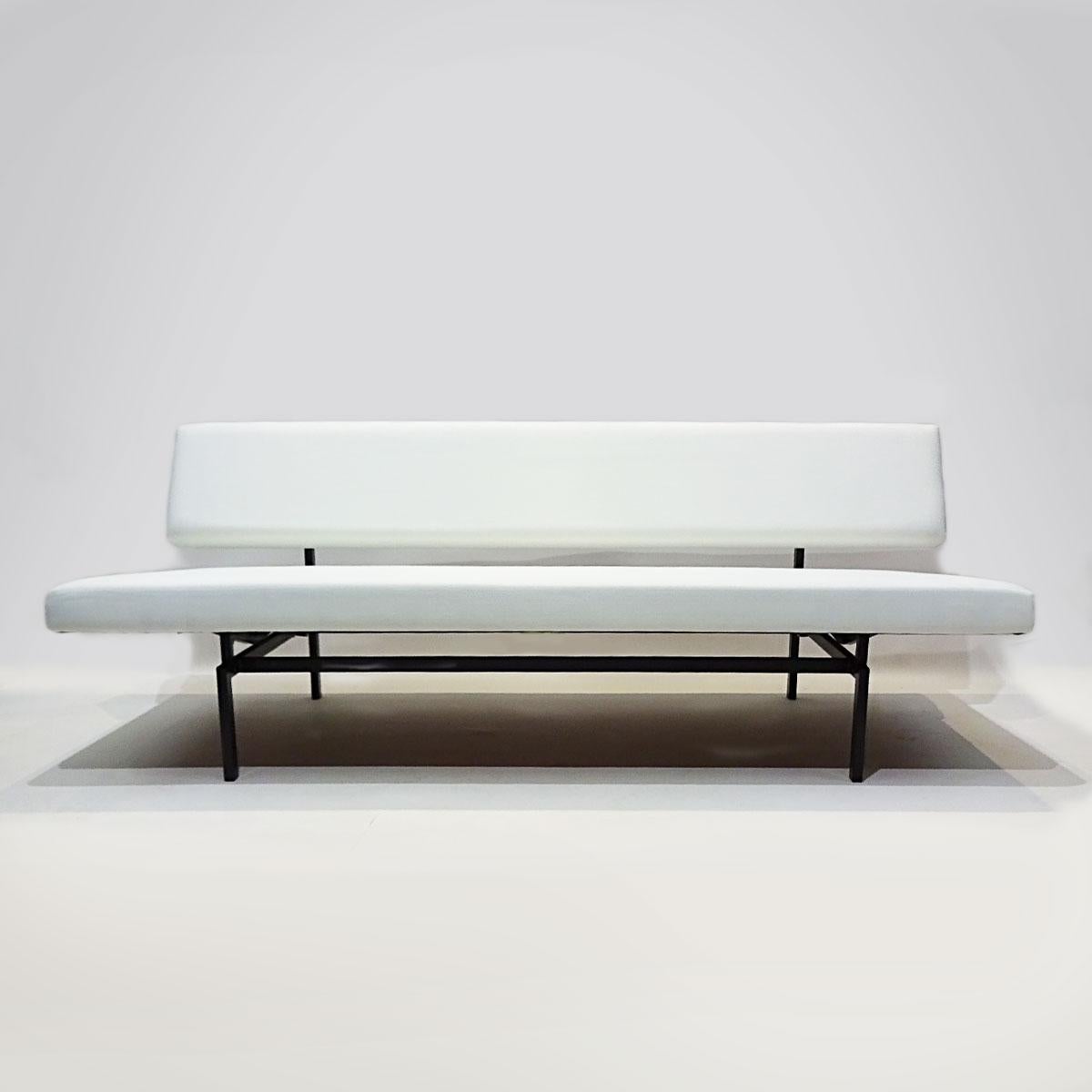 A Classic Minimalist daybed designed by Gijs Van Der Sluis in the 1950s and manufactured in the Netherlands by Gispen. This sofa’s sleek, minimalists lines has been a favourite of Interior Designers and discerning buyers for over 60 years and still