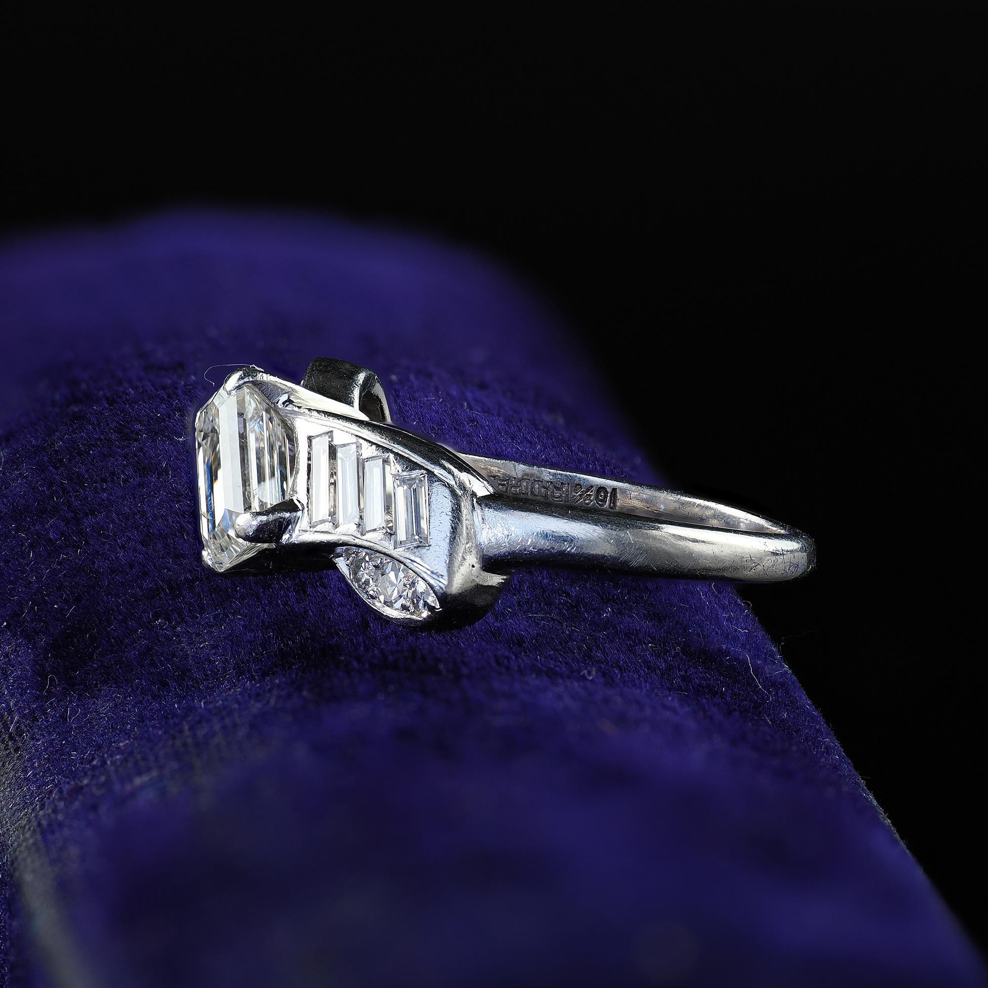 Vintage Retro Hartzberg Platinum Emerald Cut Diamond Ribbon Engagement Ring For Sale 1