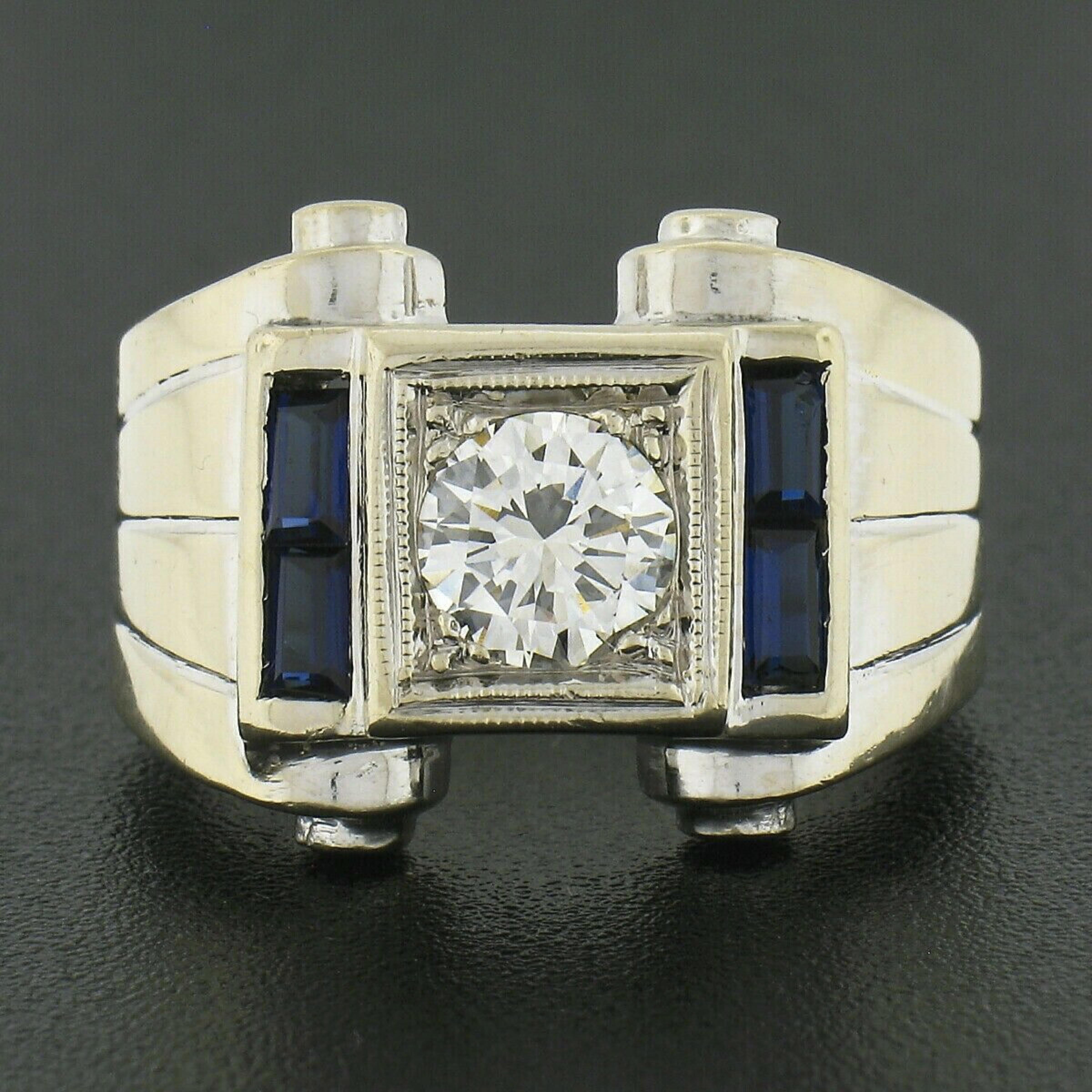 This beautiful vintage men's ring was crafted in solid 14k white gold and features a very fine quality old transitional cut diamond solitaire neatly set at the center of a squared frame. This stunning diamond weighs approximately 0.78 carats and