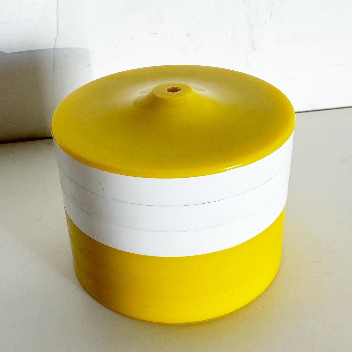 Embrace retro charm with Vintage Retro Plastic and Cork Yellow and White Stacking Coasters by Benhof, a set that blends style with functionality. Offering a perfect mix of retro design and practical use.
Vintage pieces may have age-related wear.