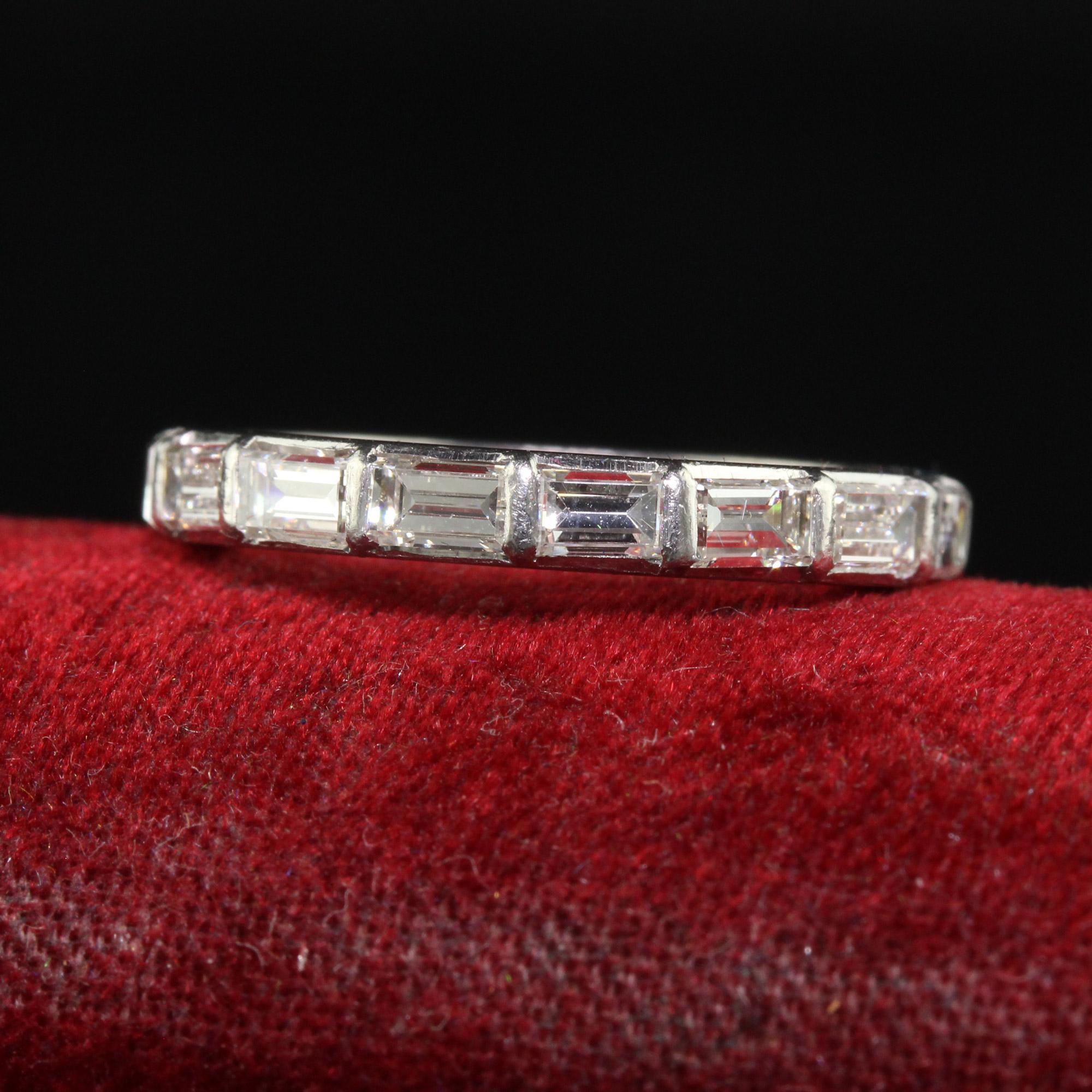 Beautiful Retro Platinum Baguette Diamond East West Eternity Band. This gorgeous vintage eternity band is crafted in platinum. There are beautiful white baguettes set in the east/west orientation around the entire band. The diamonds are all in good
