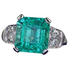 Anillo de compromiso vintage retro de platino con esmeralda colombiana y diamantes - GIA