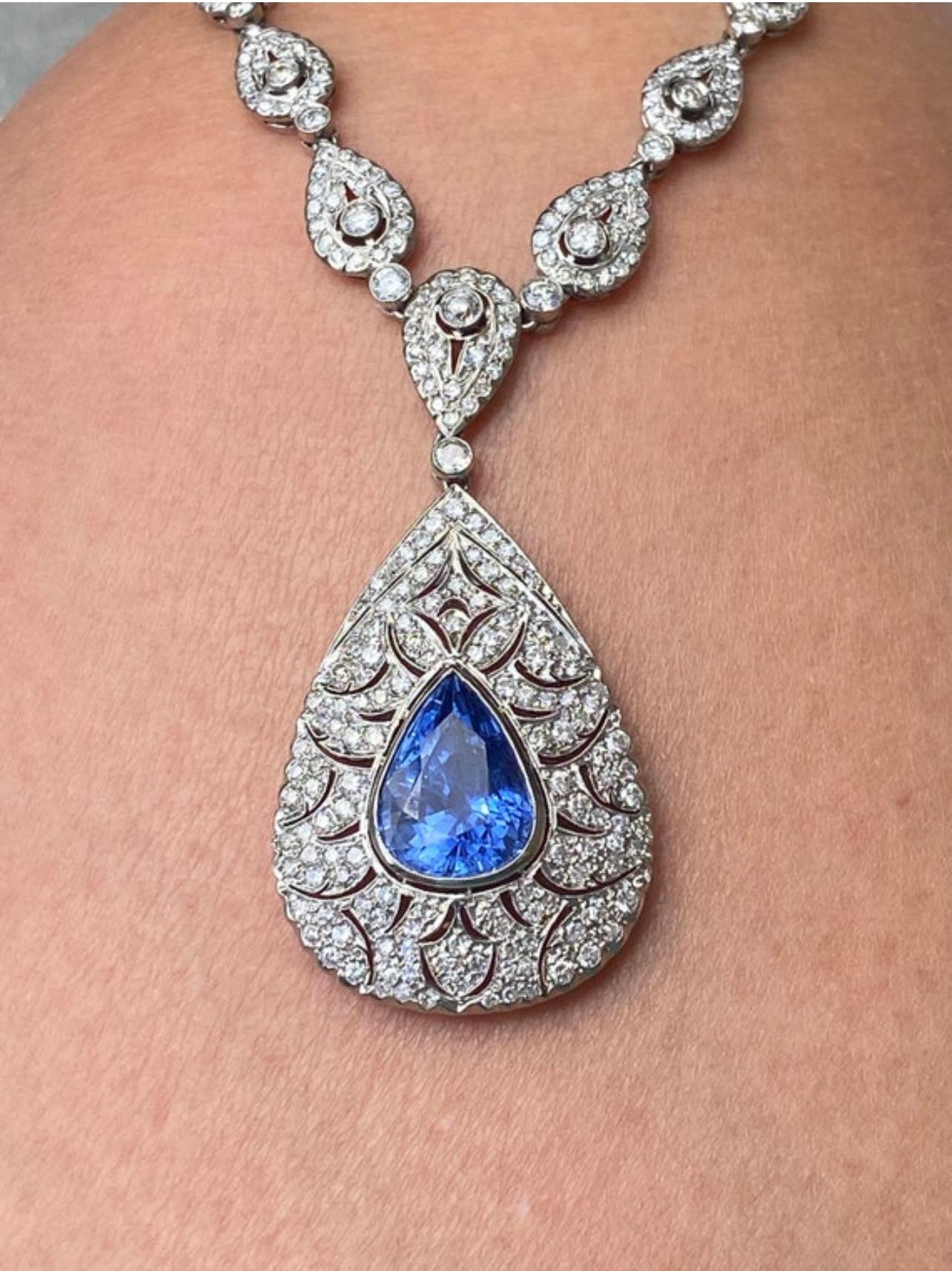 A necklace to truly stop the room! This necklace is an absolute dream. Featuring a magnificent 11.28ct pear shaped center sapphire, this necklace will be the envy of all. The center sapphire is accompanied by GIA report 2223137465 stating the center