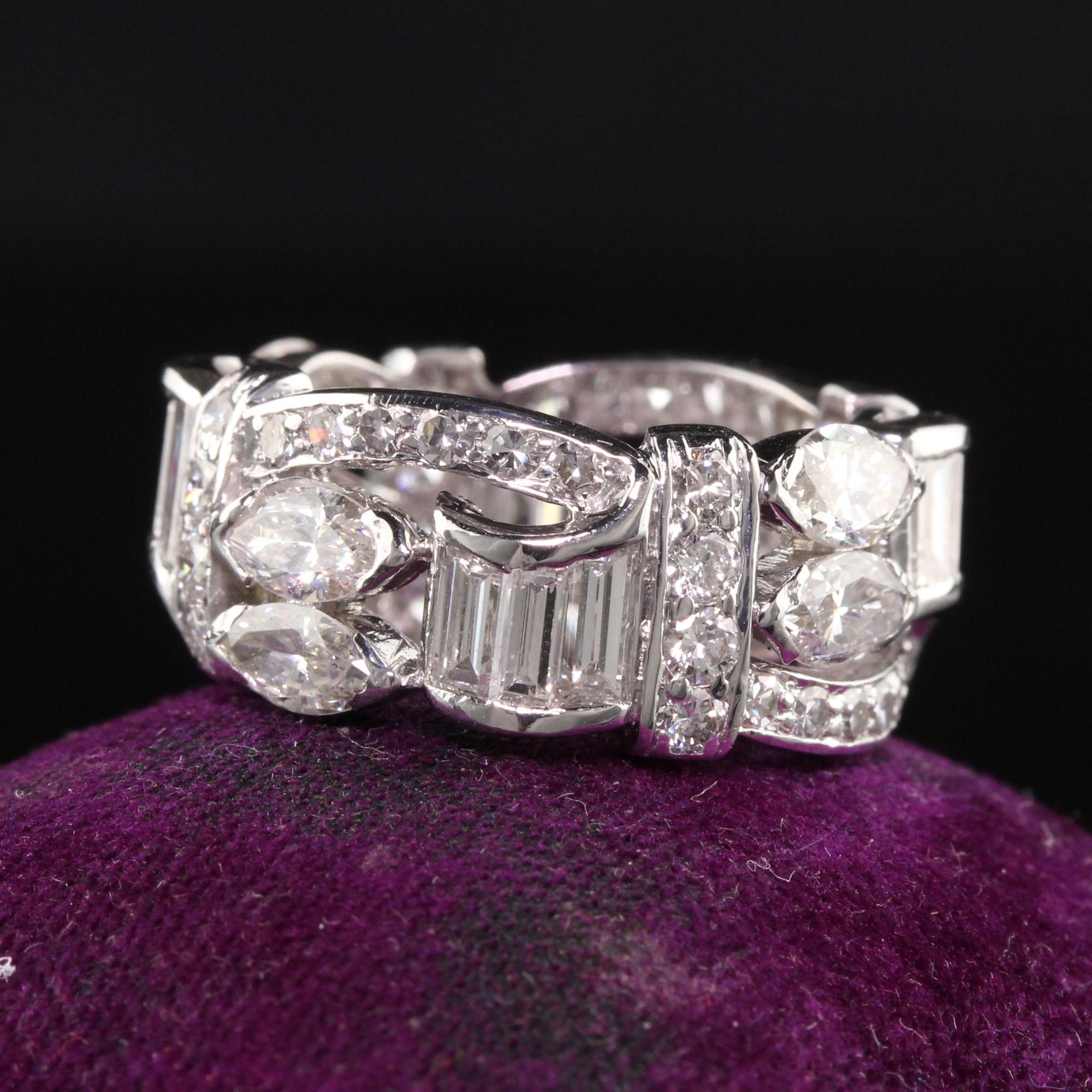 Beautiful Retro Platinum Marquise Baguette Single Cut Eternity Band.This gorgeous retro eternity ring has a mix of marquise, baguettes, and single cut diamonds on it. The diamonds are all vintage cut and has a beautiful design.

Item #R0992

Metal: