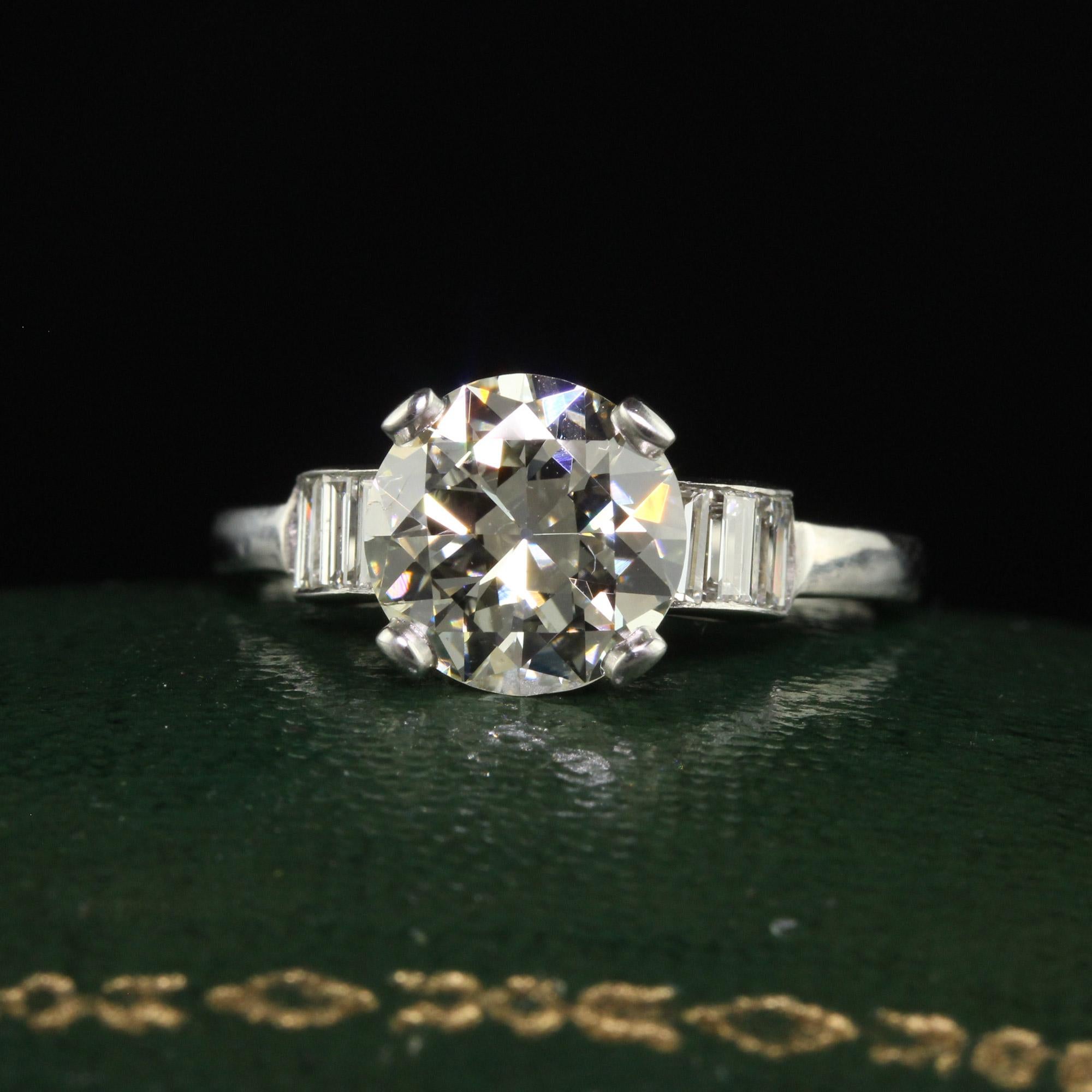 Beautiful Vintage Retro Platinum Old European Diamond Engagement Ring - GIA. This classic Retro diamond engagement ring is crafted in platinum. The center holds a beautiful old European transitional cut diamond with a GIA report and is set in a