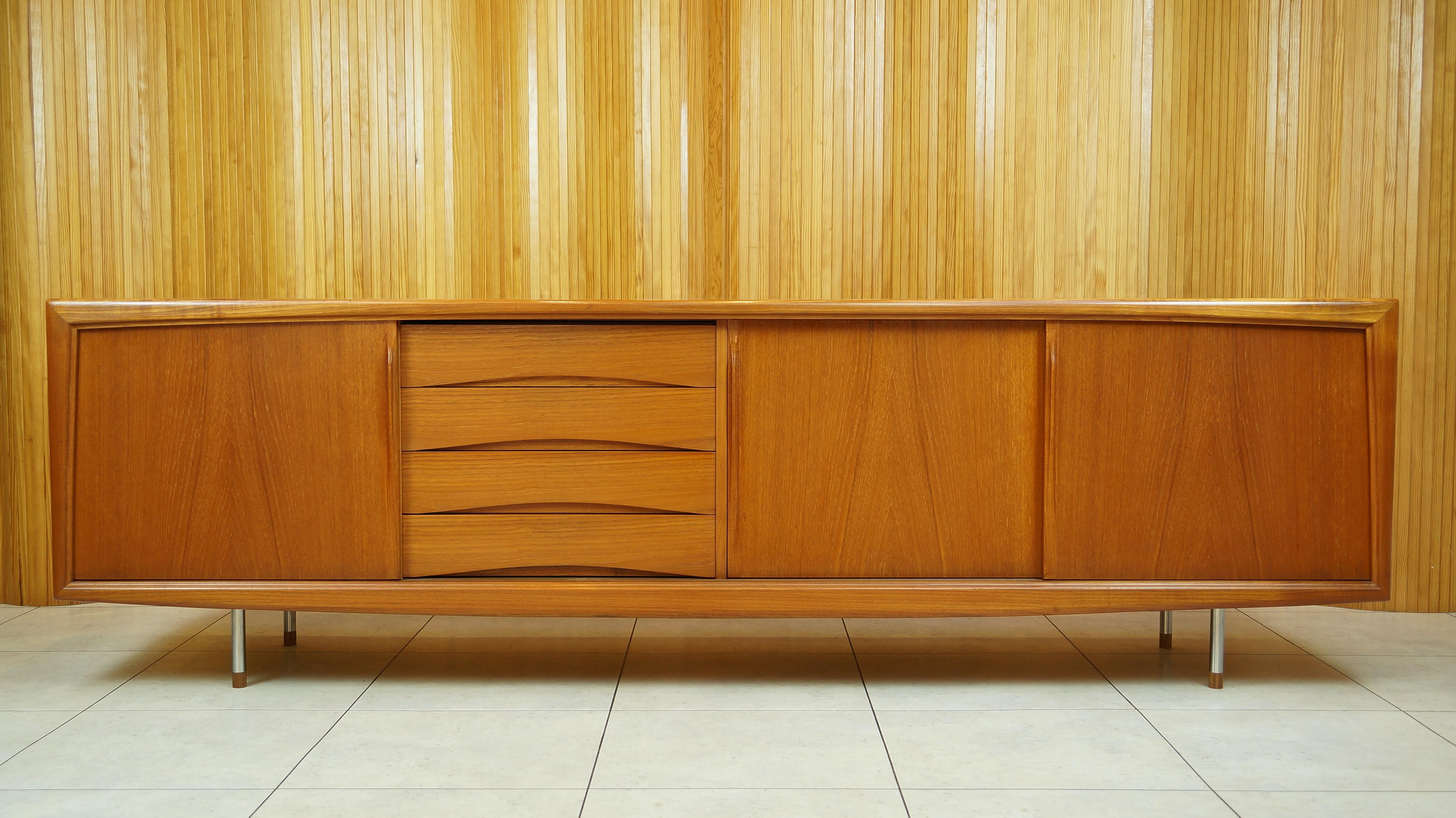 Vintage retro teak Danish sideboard or credenza
Design by: Gunni Omann for Axel Christensen Odder (ACO Mobler)
Denmark, 1960s.

Highly sought after version of this very high quality case piece with timeless design. 
This example is offered in