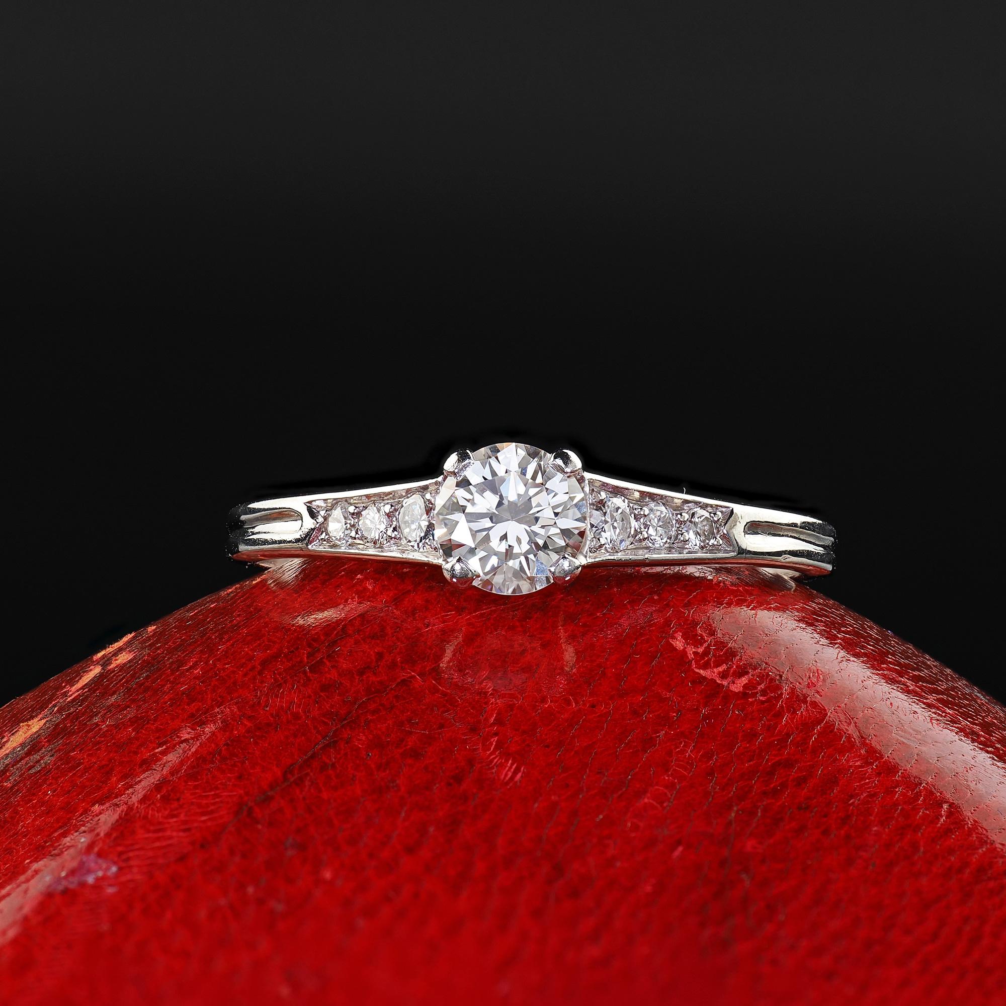 Beautiful Vintage Retro Tiffany and Co Platinum Diamond Engagement Ring - Size 7 3/4. This classic retro Tiffany and Co diamond engagement ring is crafted in platinum. This classic ring features a beautiful transitional cut diamond in the center of
