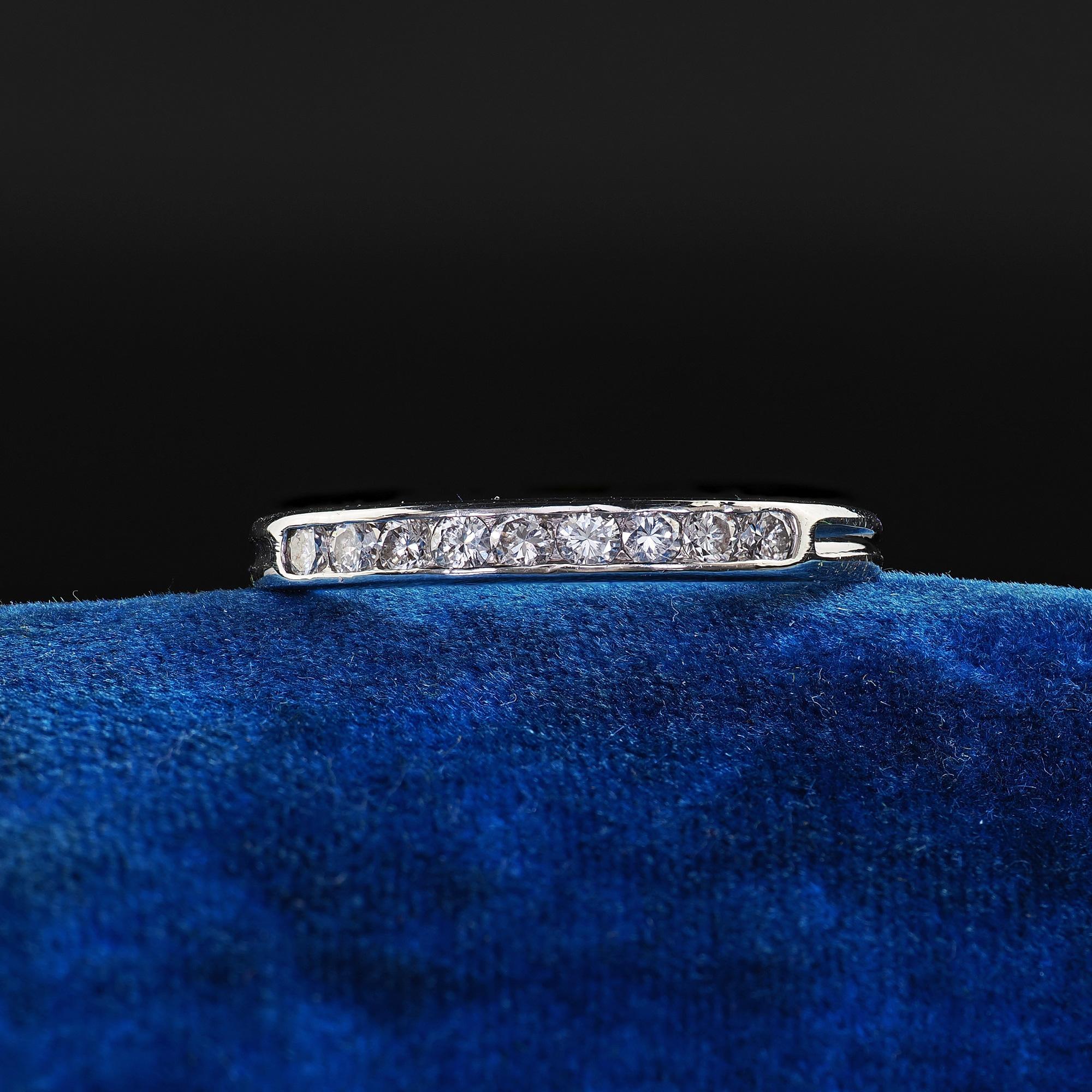 Beautiful Vintage Retro Tiffany and Co Platinum Diamond Wedding Band Ring - Size 7 3/4. This gorgeous Retro Tiffany and Co diamond wedding band is crafted in platinum. This beautiful ring features transitional cut diamonds set on top of a classic