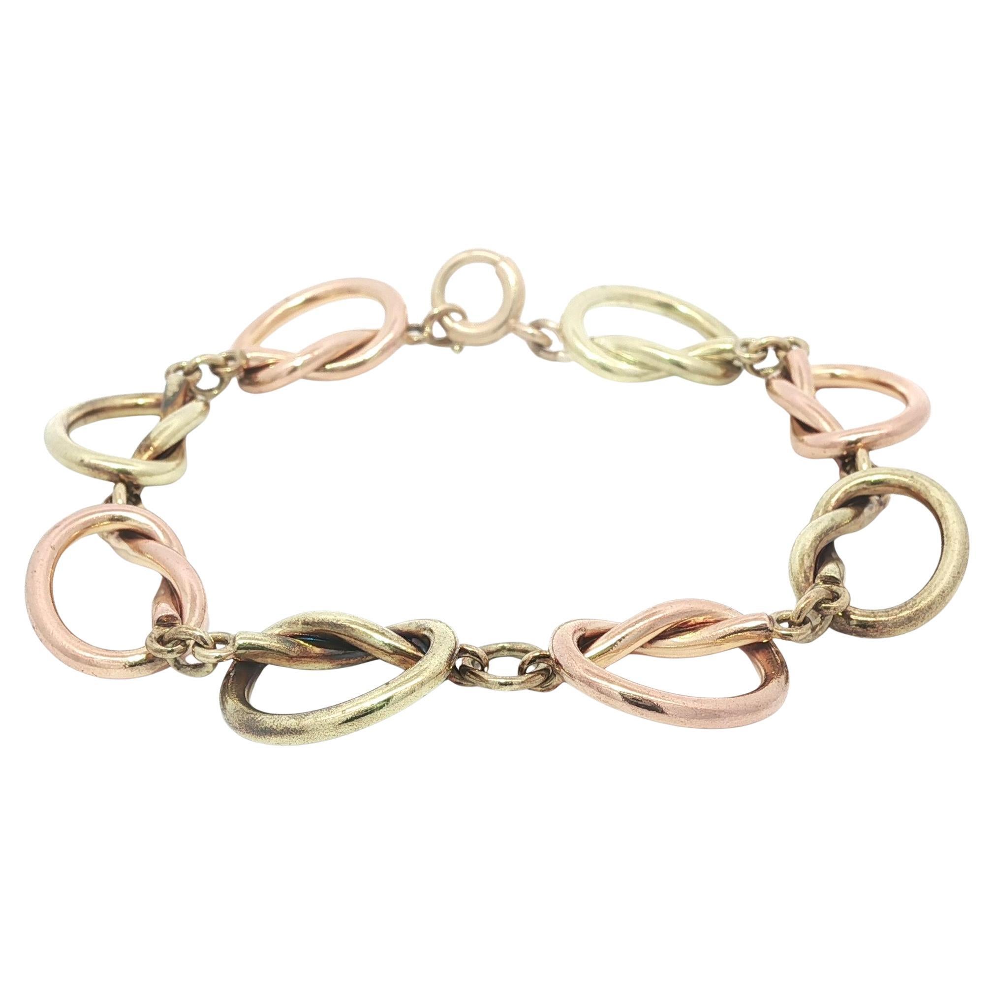 Pulsera vintage retro de nudo abierto Tiffany
Co. de oro rosa y verde de 14k