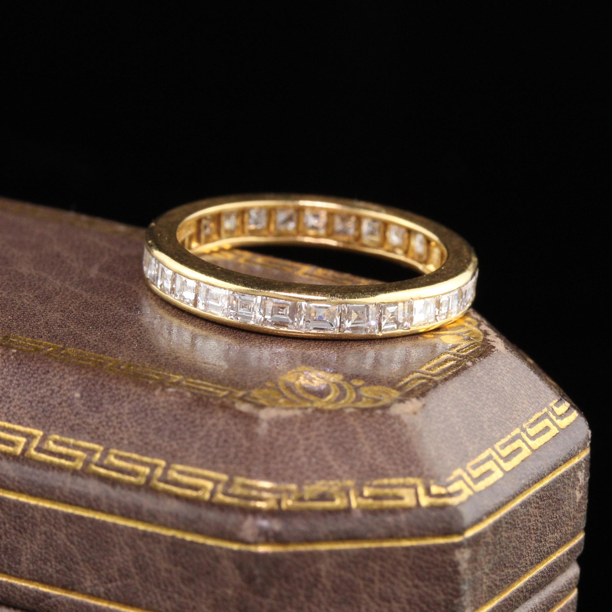 Stunning Vintage Tiffany & Co eternity band in yellow gold with carre cut diamonds going all the way around. In excellent condition.

#R0396

Metal: 18K Yellow Gold 

Weight: 2.4 Grams

Total Diamond Weight: Approximately 1.50 cts carre cut
