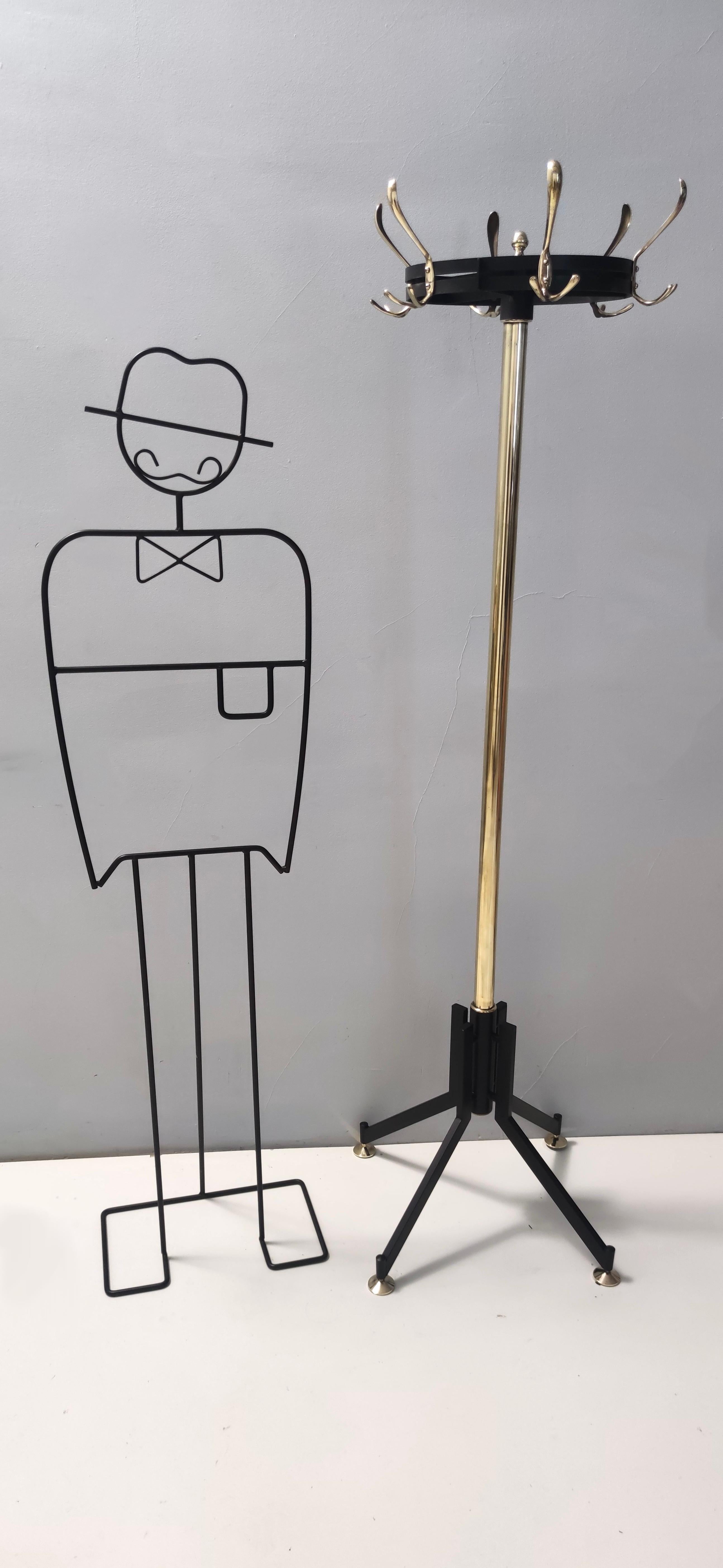 Made in Italy, 1950s.
This coat rack features a varnished iron and brass frame. 
The upper part is revolving.
It is a vintage piece, therefore it might show slight traces of use, but it can be considered as in very good original condition as it's