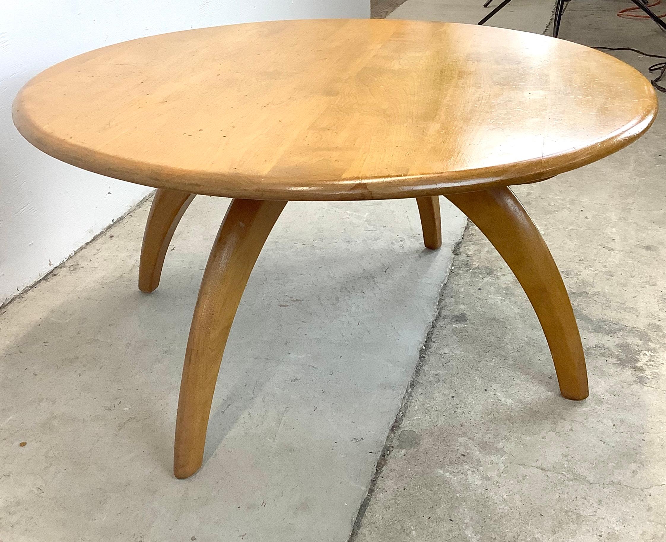 Elevate your living space with the timeless charm of this Vintage Revolving Top Coffee Table by Heywood-Wakefield, available now from Secondhand Stories. This remarkably versatile piece brings together mid-century aesthetics and functional design,