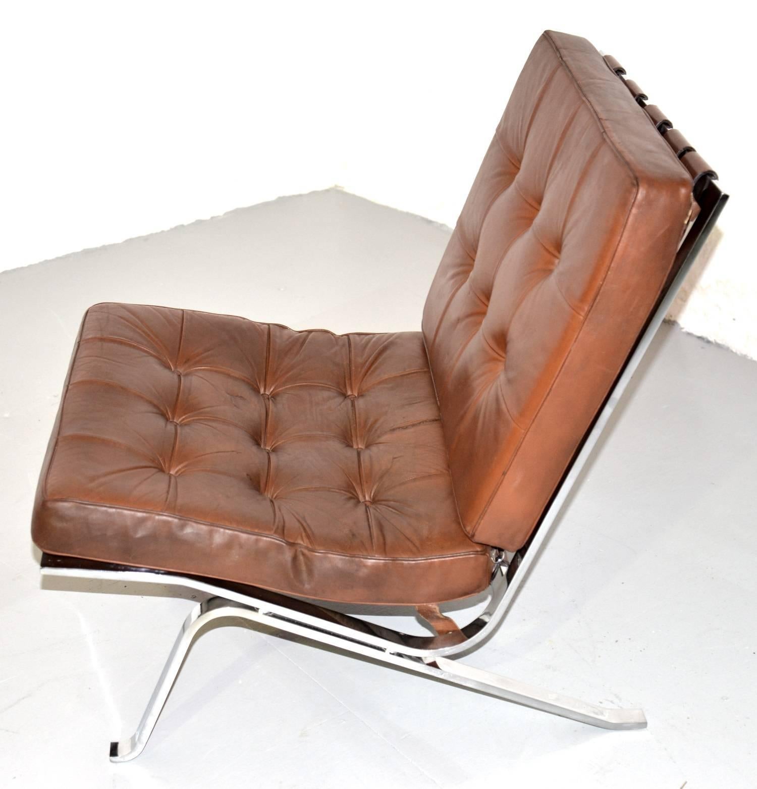 Discounted shipping rates for our US and International customers (from 2 weeks door to door)

We are delighted to bring to you a rare vintage RH-301 flat bar lounge chair in original tan leather designed by Robert Haussmann for de Sede. Hand built