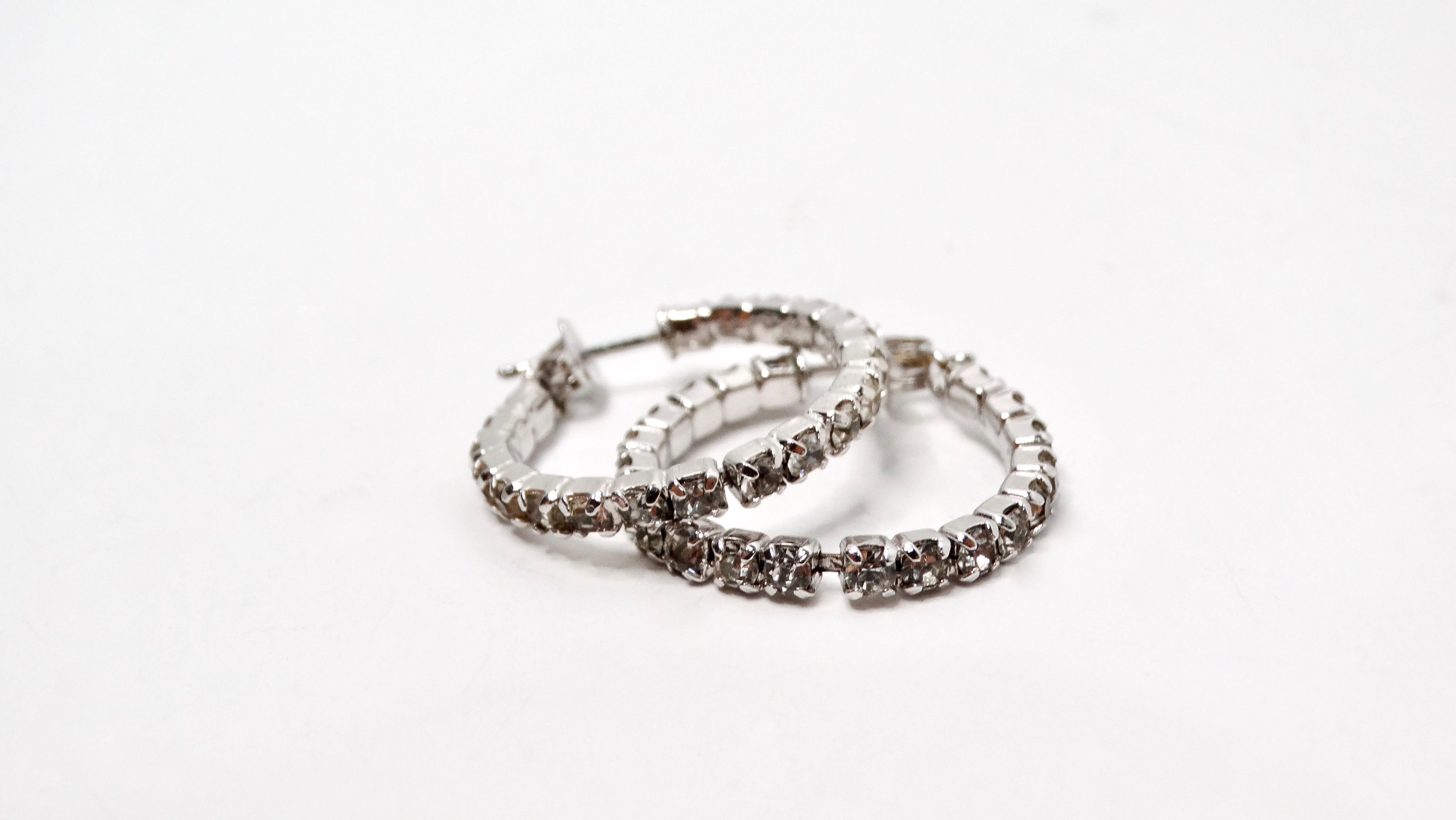 Elevate your accessory collection with these exquisite Vintage Rhinestone Surrounded Sterling Silver Plated Flexible Hoop Earrings. These stunning earrings boast a classic yet contemporary design, featuring a delicate array of sparkling rhinestones