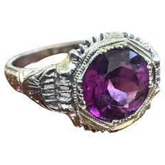 Anillo de compromiso vintage de oro blanco de 18 quilates con granate rodolita