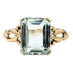 Anello vintage con acquamarina a forma di nastro in oro giallo 10k