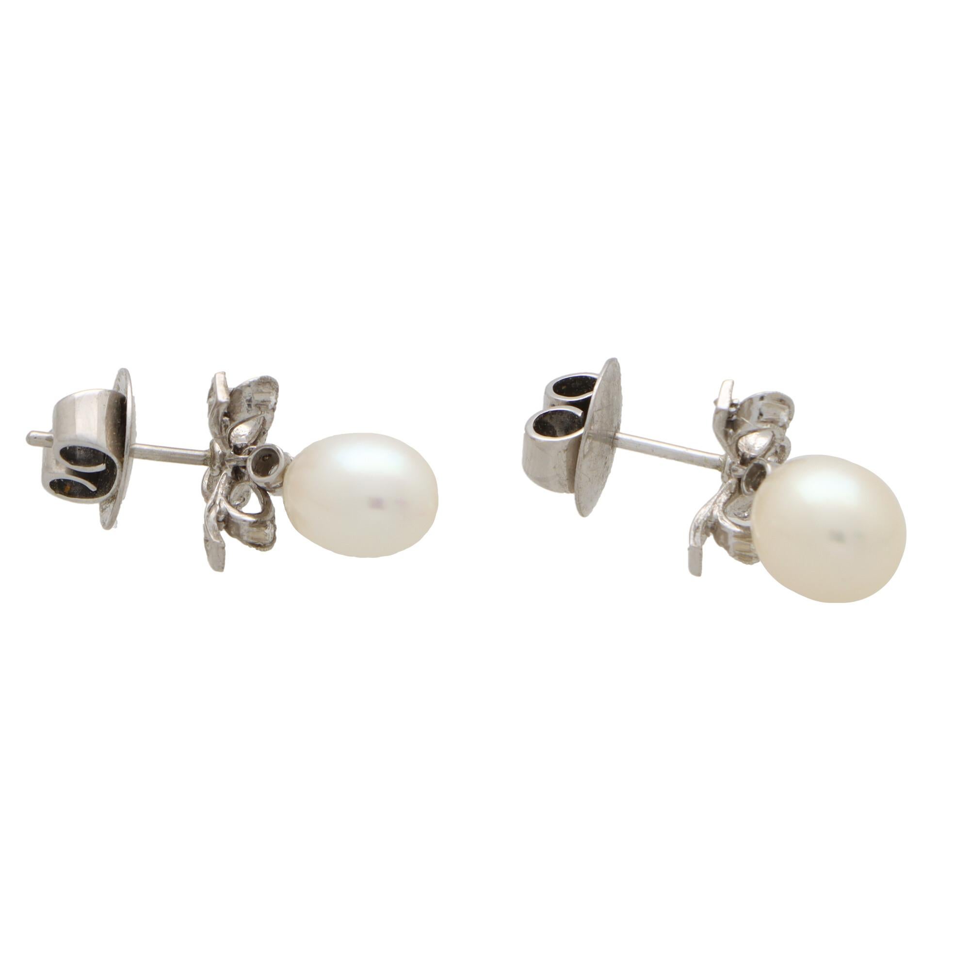 Round Cut Vintage Ribbon Topped Pearl and Diamond Drop Earrings in 18k White Gold