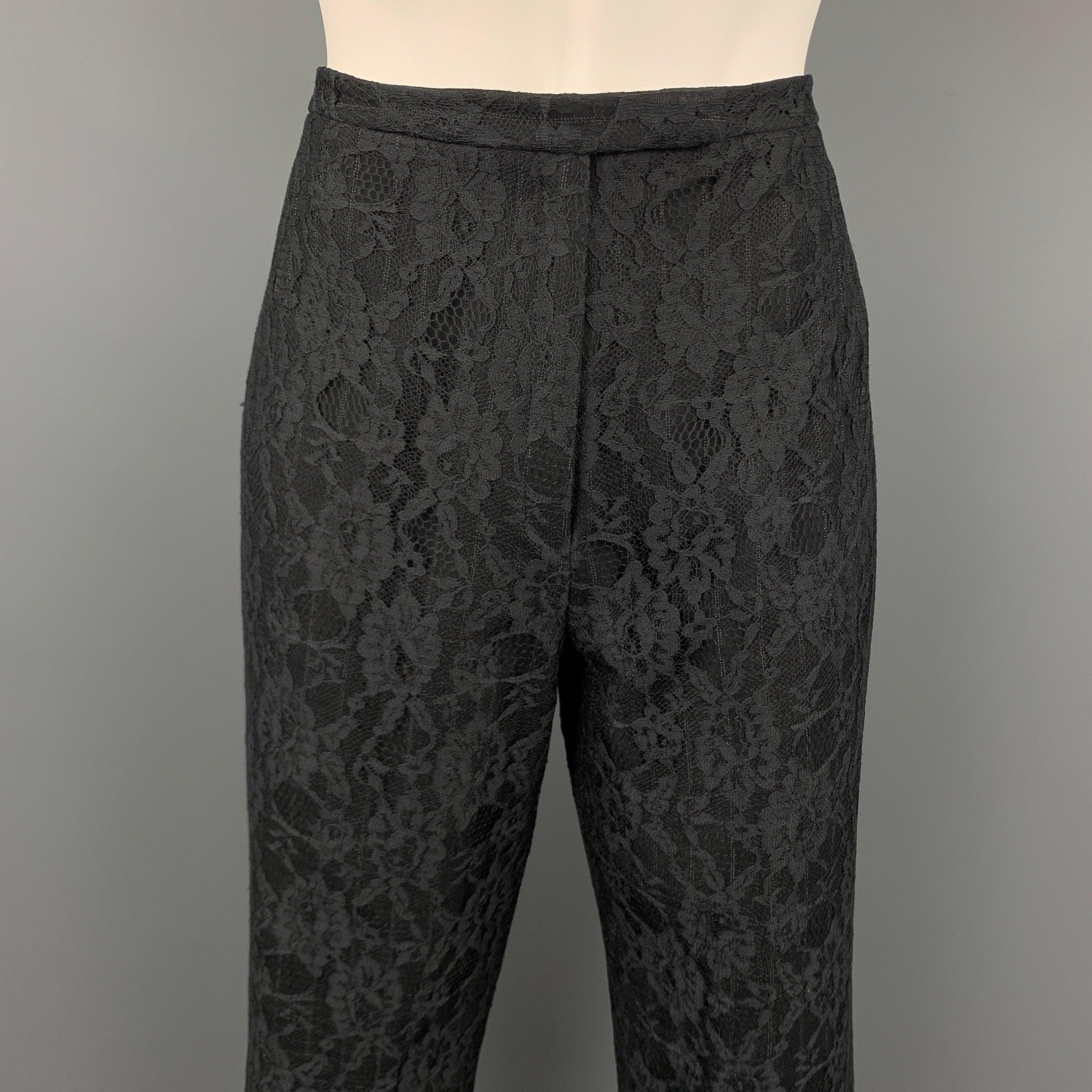 Vintage RICHARD TYLER evening dress pants comes in a black lace wool blend featuring a straight leg, front tab, and a zip fly closure. Made in USA.Very Good
Pre-Owned Condition. 

Marked:   10 

Measurements: 
  Waist: 30 inches 
Rise: 10 inches