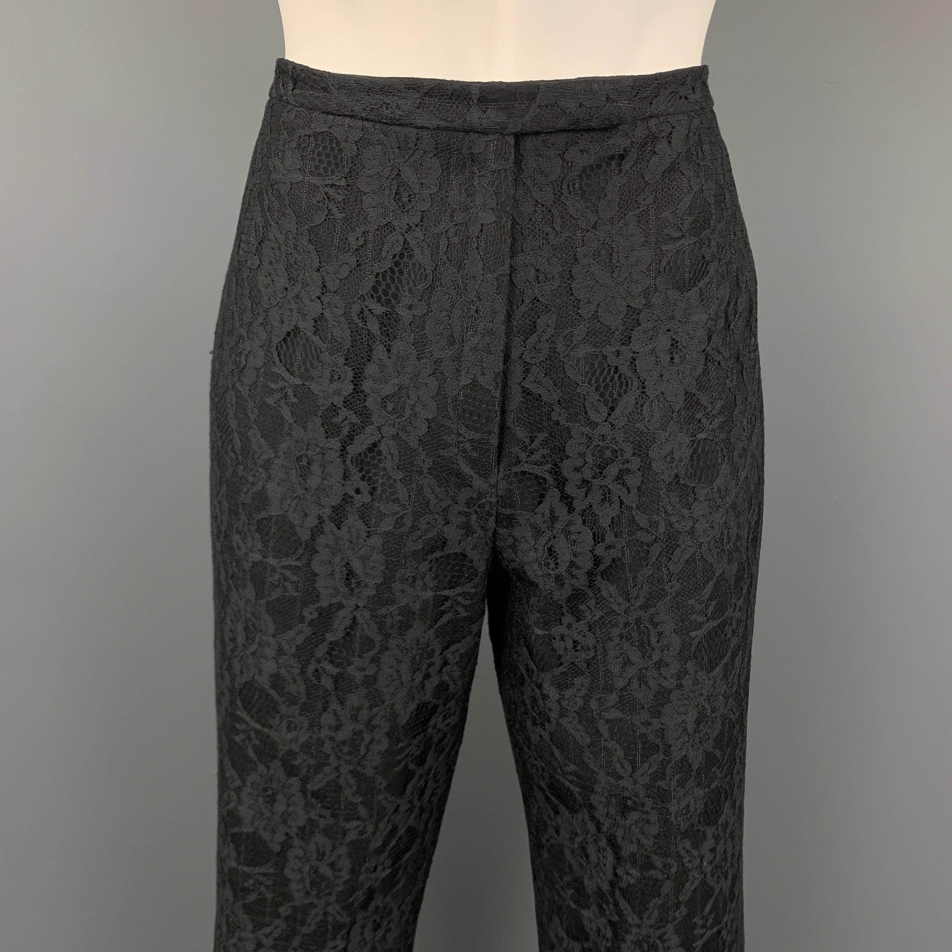 Vintage RICHARD TYLER evening dress pants comes in a black lace wool blend featuring a straight leg, front tab, and a zip fly closure. Made in USA.

Very Good Pre-Owned Condition.
Marked: 10

Measurements:

Waist: 30 in. 
Rise: 10 in. 
Inseam: 28