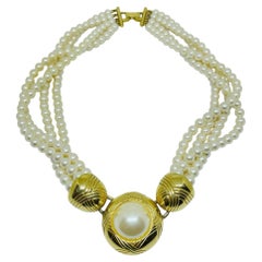 Collana firmata RICHELIEU d'epoca con perle finte in tonalità oro e con fili multipli