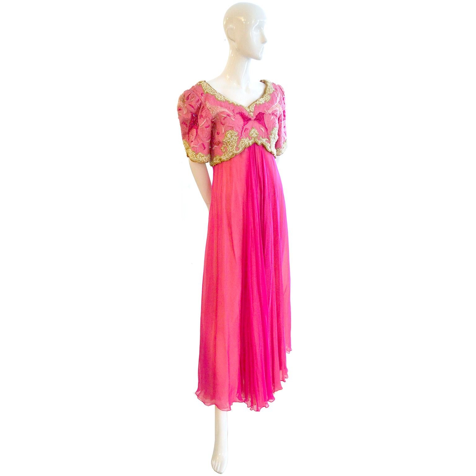 This is an exceptional Richilene New York vintage 1980's formal evening gown in a feather light pink silk chiffon with a heavily embroidered, beaded over bodice with stacked sequins.  There are beautiful seed pearls and the embroidery includes