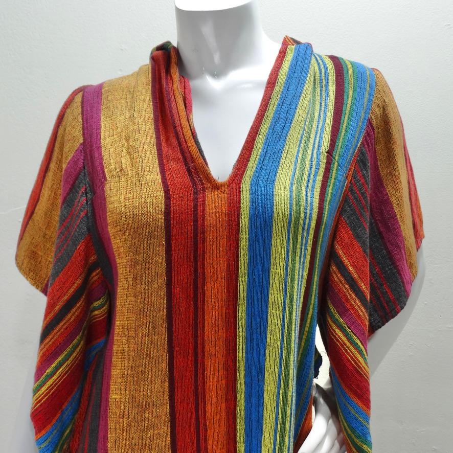 This vintage Rikma kaftan dress is begging to be added to your suitcase this summer vacation! Super fun vintage Rikma kaftan in a gorgeous woven textile wit multicolor stripes. Featuring the most unique style sleeves with black tassels hanging down,