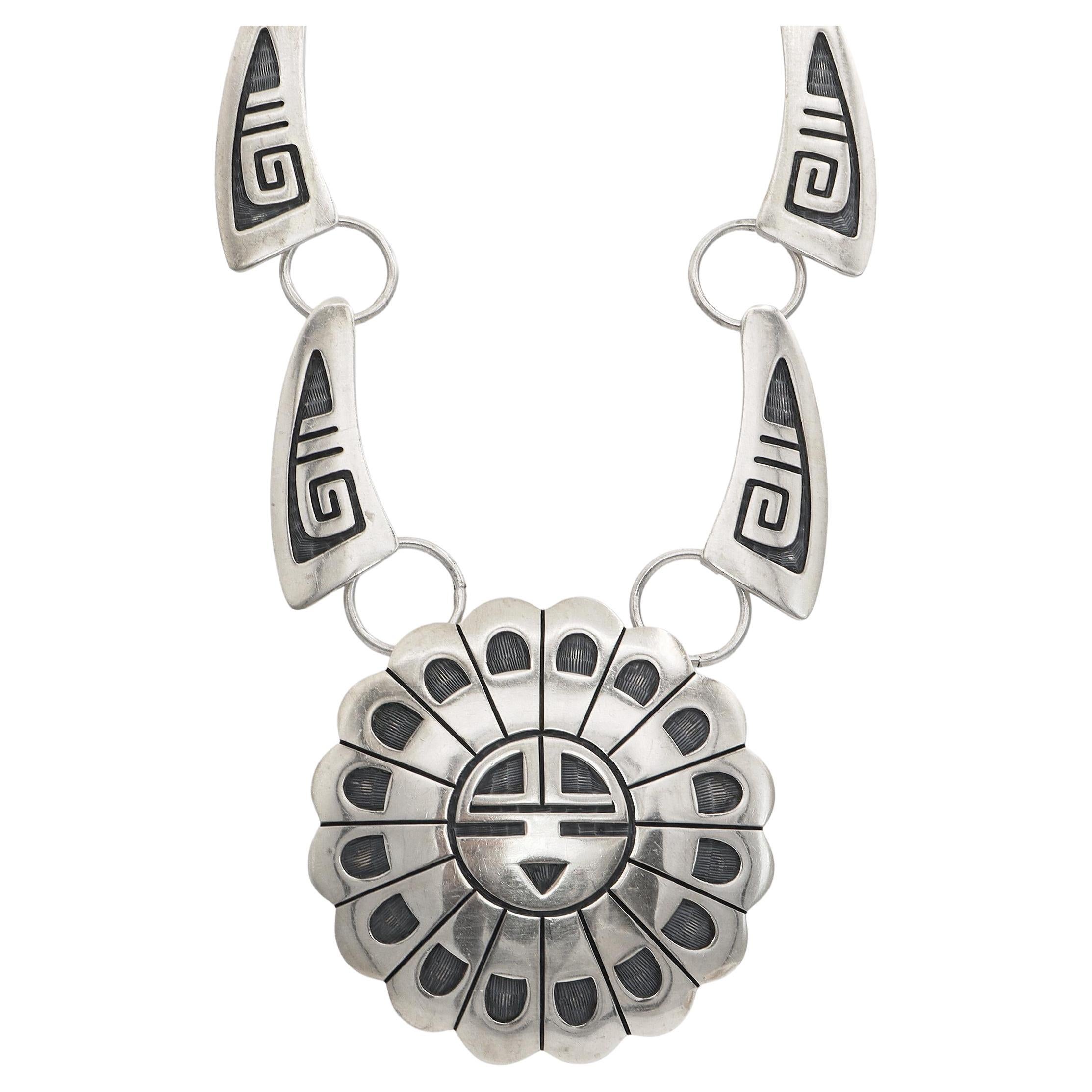 Collana d'epoca Riley Polequaptewa in argento Hopi con volto solare