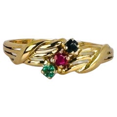 Anillo vintage Oro amarillo 18k con rubí, esmeralda y zafiro azul 0,06 quilates