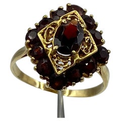 Vintage Ring in 18 Kt Yellow Gold and "Garnets".