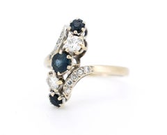 Vintage ring in 18K gold, sapphire, and diamonds - 1960