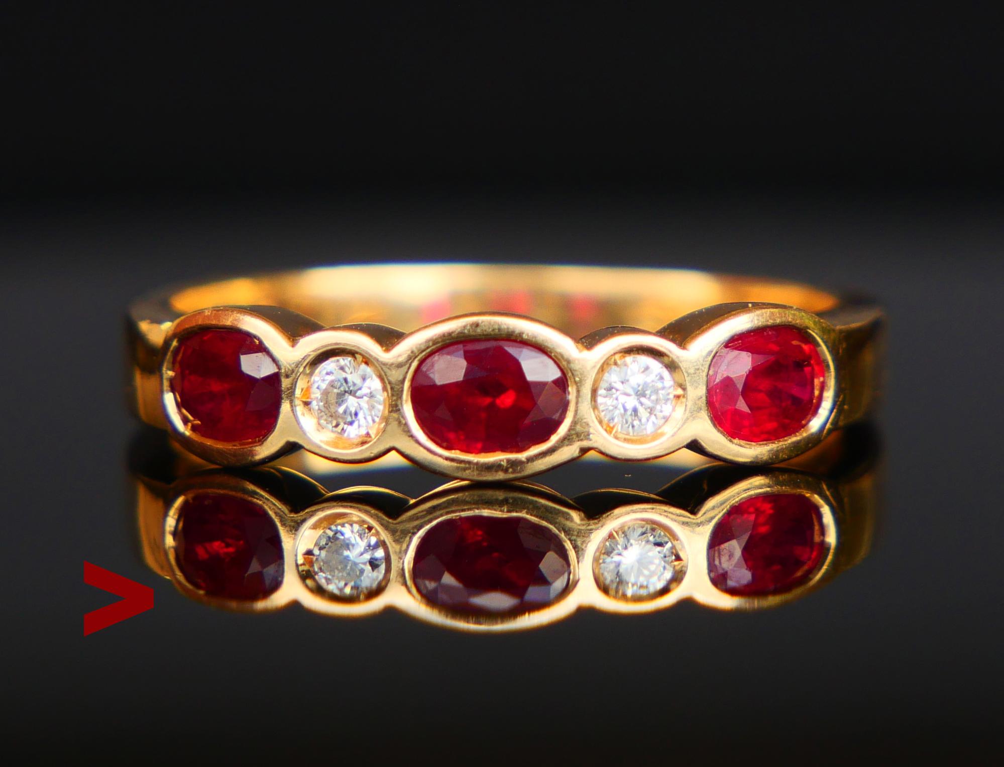 Beautiful Vintage Ruby and Diamonds Ring hand-made in Italy ca. 1960s - 1970s. Italian hallmarks, logo of maker, 750.

Three natural 4x3 mm x 2.55 mm deep / 0.25 ct each
Two natural old European cut Diamonds Ø 2.5 mm x 1.8 mm deep / 0.08 ct each,