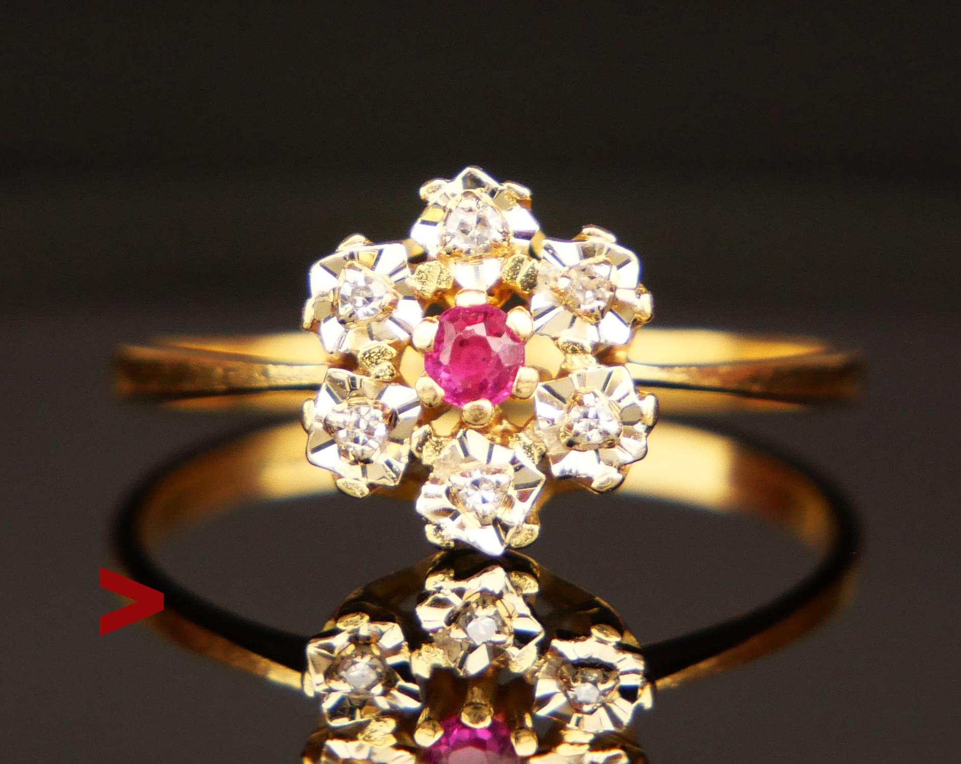 Vintage ca 1960s -1970s  European ring in solid 18K Yellow Gold with claw set diamond cut natural Red Ruby and six diamond cut Diamonds set into faceted clusters . Band hallmarked/tested solid 18K Gold.

Crown : 10mm x 6.5 mm deep. Ruby : Ø 2.5 mm /