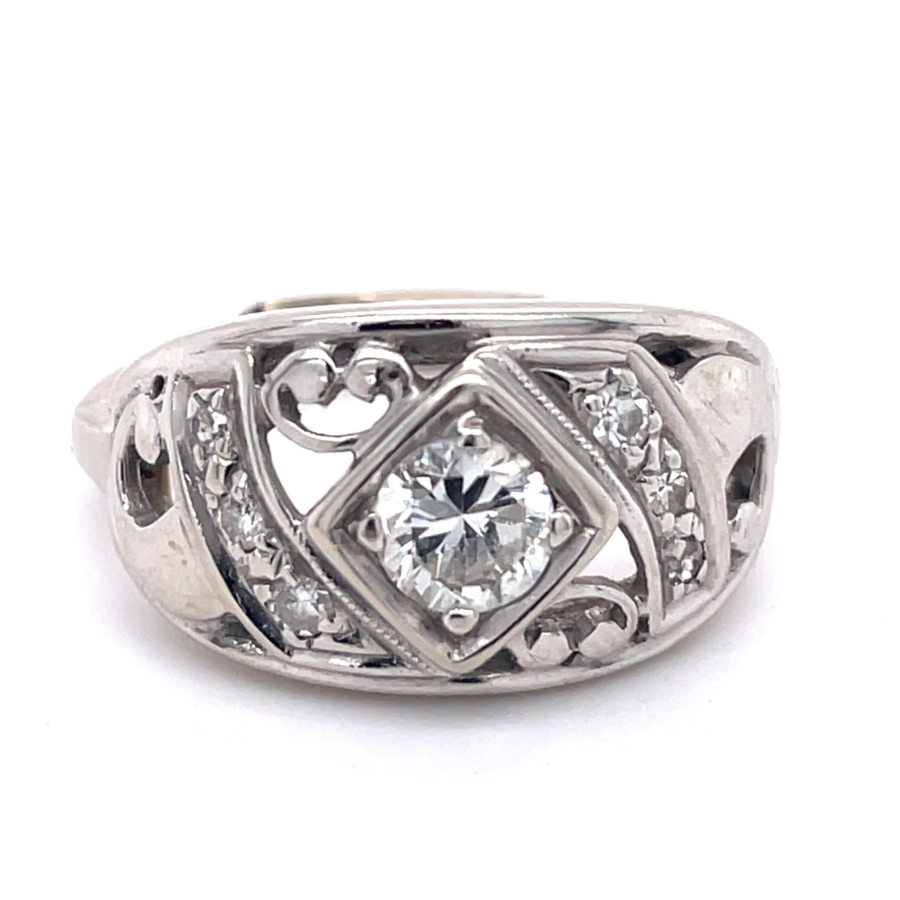 This ring has an easy slip-on/off gadget in its shank. so that it's easier to get the ring through the finger joint and onto the finger

~~ S e t t i n g ~~
Solid 14k White Gold
4.7 grams
Ring Size 6.25 US
 
~~ Stones ~~


Main Stone:
Old European