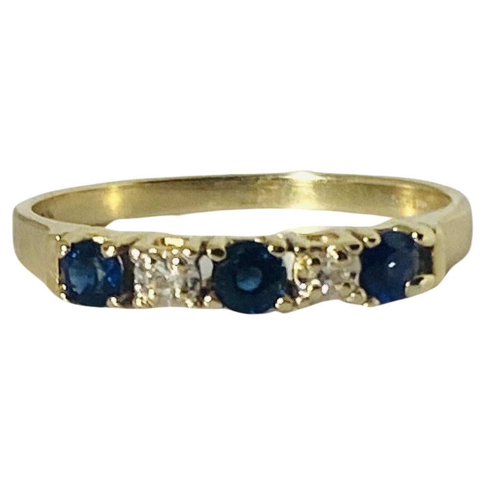 Vintage ring with blue sapphires & diamonds from the 1950S, 14 carat yellow gold For Sale
