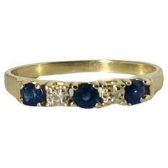 Retro ring with blue sapphires & diamonds from the 1950S, 14 carat yellow gold