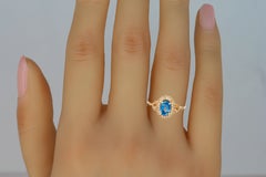 Vintage ring with sapphire and diamonds in 14k gold