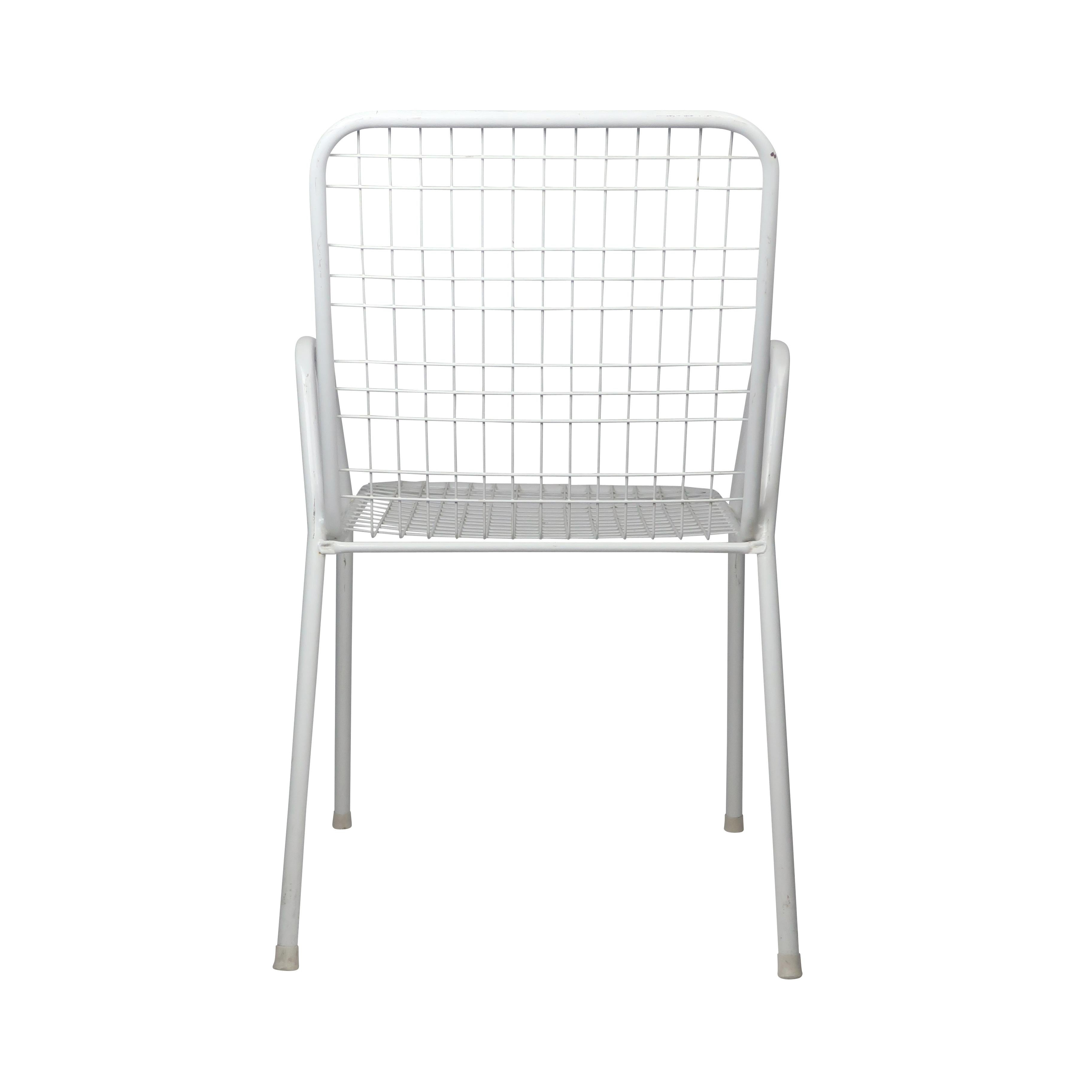 A set of six Rio indoor / outdoor armchairs by Emu. Made with steel wire coated in white resin over a tubular frame, these are lightweight and durable.

In excellent vintage condition with very light yellowing to a few, a few marks on the legs