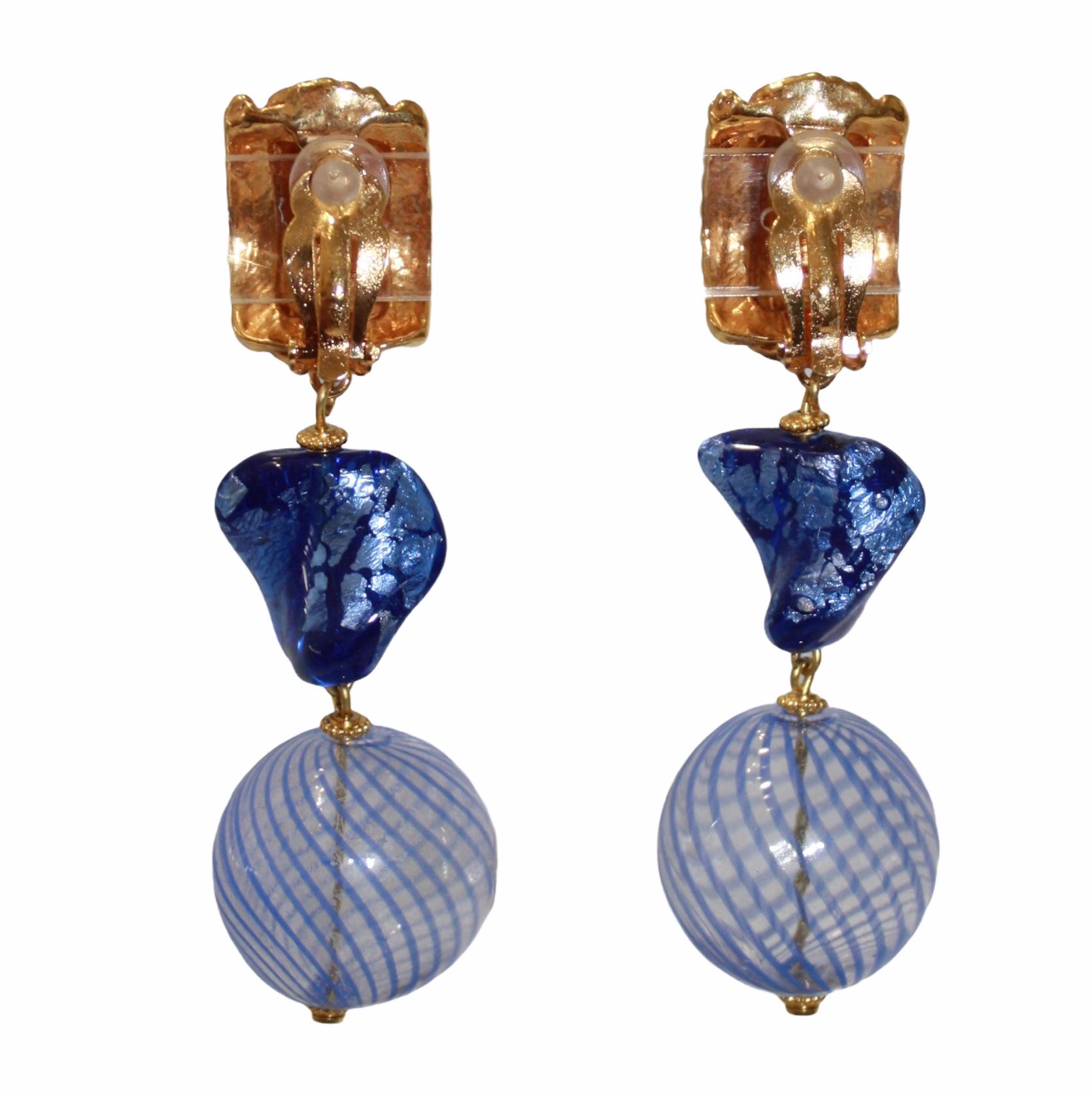 Circa 1990s beautiful and rare drops earrings featuring Murano glass work in majorelle blue, 24-carat dipped brass. Clip earrings with YSL signature in the back.