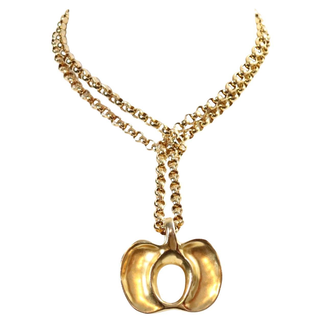 Vintage Robert Lee Morris Gold Pendant Circa 1980s.  This gorgeous RLM pendant could be interpreted as abstract or many other things.  It could be an apple or something else.  I'm not sure, but it's chic and quite current and will always be on