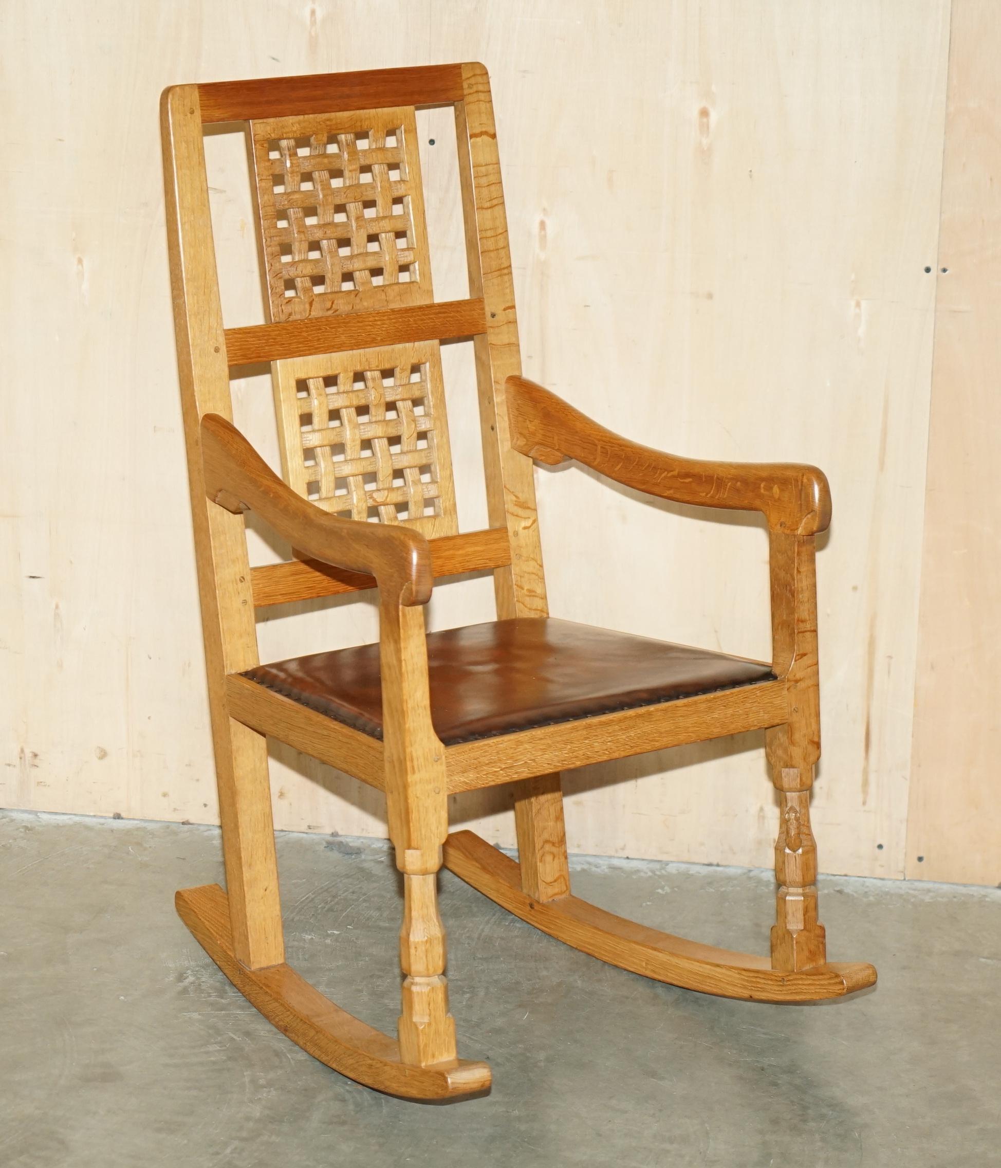 Royal House Antiques

Royal House Antiques is delighted to offer for sale absolutely stunning vintage one of a kind Robert Mouseman Thompson hand carved oak Rocking armchair 

Please note the delivery fee listed is just a guide, it covers within the